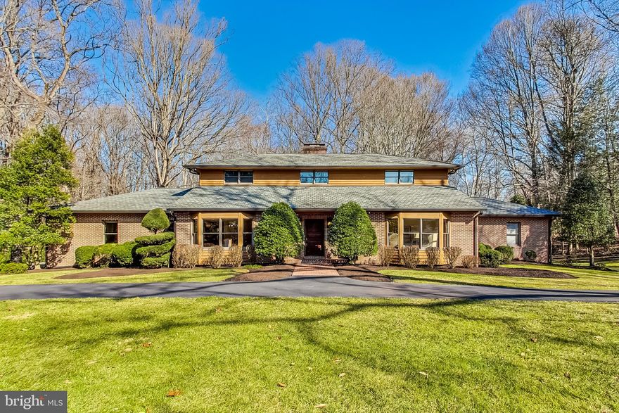 Major Price Reduction!!

Welcome to this stunning transitional style home offering spacious living across three levels, with a second detached two-car garage providing additional versatile space. Boasting 6 bedrooms and a plethora of amenities, this residence is an ideal blend of comfort and luxury.

Main Level:

Enter into a large tile foyer, setting the tone for elegance and warmth throughout the home.
The main level features a large family room adorned with a fireplace, perfect for gatherings and cozy evenings.
A generously sized living room offers ample space for entertaining or relaxation.
Hardwood flooring extends seamlessly, adding a touch of sophistication to each room.
The eat-in kitchen is bathed in natural light from numerous windows, creating a bright and inviting atmosphere.
Main Level Primary Suite:
Enjoy the convenience of a main level primary bedroom suite, complete with a sitting area and abundant closets.
The spacious primary bath is a retreat in itself, featuring a soaking tub, two vanities, and a walk-in shower for ultimate relaxation and rejuvenation.

Upper Level:
Ascend to the upper level to find a large bedroom, en-suite, with an attached full bathroom, providing comfort and privacy.
Two additional bedrooms share a Jack and Jill bathroom, perfect for family or guests.
A charming sitting area with a brick wood-burning fireplace adds character and coziness.

Lower Level:
The lower level offers even more living space, including a large family room area with a wood-burning fireplace, leading out to a slate patio for outdoor enjoyment.
Discover a bedroom with a private bath, providing comfort and convenience for guests.
Stay active in the mirrored exercise room, perfect for maintaining a healthy lifestyle.
Entertain with ease in the bar area, complete with a sink, refrigerator, and microwave.
Work from home in the office space, featuring built-in desk and shelving.
The large game room is an entertainer's dream, ideal for hosting game nights and gatherings.
A walk-in cedar closet provides ample storage space for seasonal items and more.

Additional Features:
Enjoy the convenience of a whole house vacuum system, making cleaning a breeze.
The second detached two-car garage offers versatility with a lower level suite, including a private full bath and kitchenette.  This bonus space would be ideal for guests, extended family members or can be used as a private office.
Don't miss your opportunity to own this exquisite home, offering luxurious living spaces and endless possibilities for relaxation and entertainment.