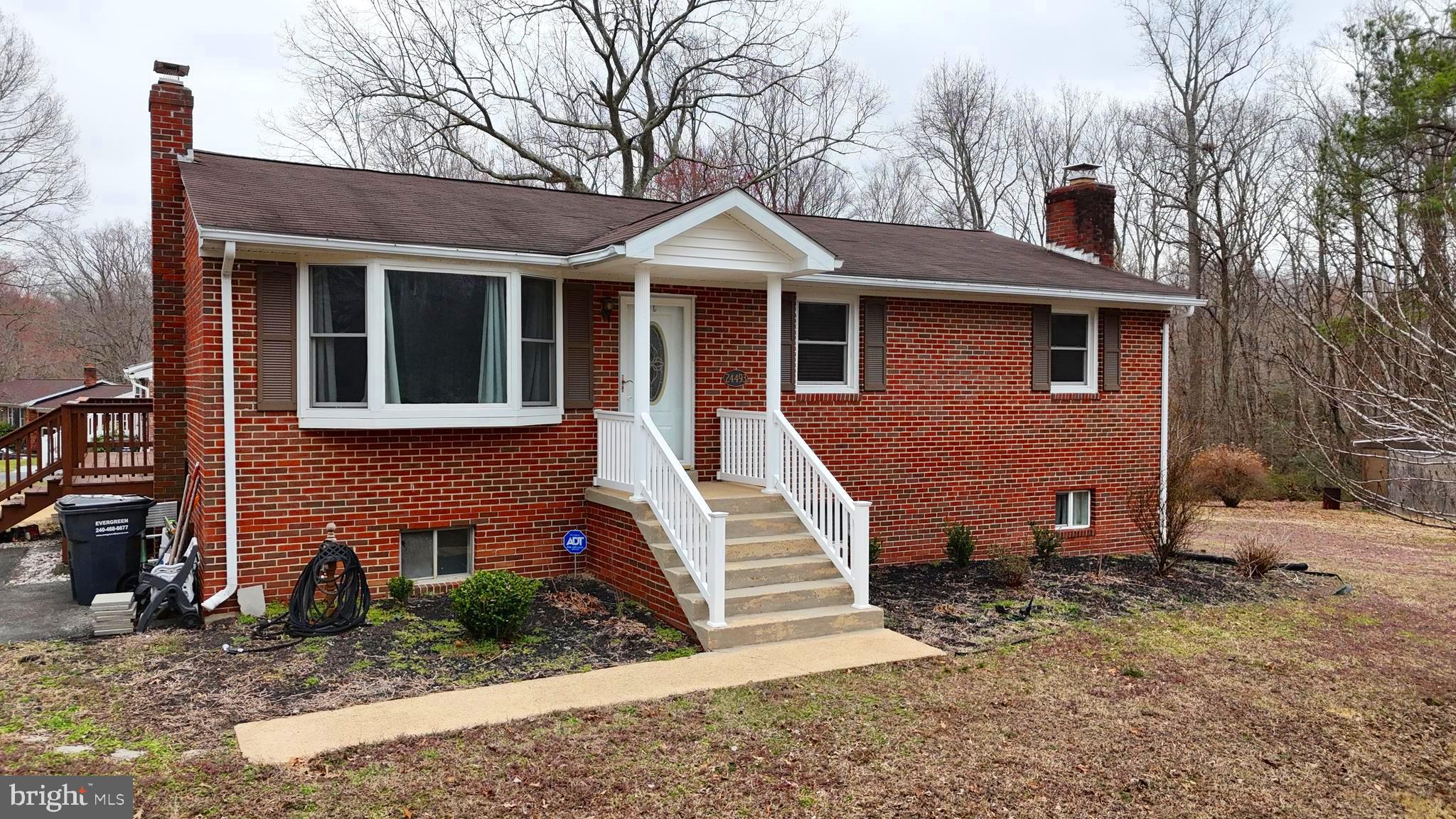 Price Improvement! Don’t miss your chance to own a prime corner lot in the sought-after Redhill subdivision of Hollywood, MD. Just one of 7 lots on this cul-de-sac with no HOA! This well-maintained brick rambler has a fenced backyard, great for pets. The home is perfectly situated just a short distance from Hollywood Elementary and minutes from shopping, restaurants, PAX Naval Air Station, and much more.
Inside, the home features beautiful hardwood floors throughout the main level, a spacious kitchen with granite countertops, and a large addition that includes an extra bedroom and a cozy den. The fully finished basement boasts elegant tile flooring and custom pine ceilings, adding warmth and character. Enjoy the convenience of a generous laundry room and the comfort of a gas fireplace in the den.
Schedule your showing today—this rare find won’t last long!