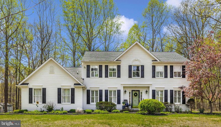 ***OFFER DEADLINE 4/29/25 AT 12 NOON.  This meticulously updated 4-bedroom, 3.5-bathroom home offers over 4,500 sq ft of luxurious living space on a private 1.36-acre lot in the desirable White Oaks community.    The home is located on quiet street at the end of the cul de sac.   The grand two-story foyer leads to expansive living and dining areas, perfect for entertaining. The chef’s kitchen features a designer island, granite countertops, stainless steel appliances, beverage refrigerator and a breakfast bar.  Huge walk-in pantry.  The 20'x26' family room boasts a custom floor-to-ceiling stone fireplace, cathedral ceilings, and abundant natural light.    The family room also features new beautiful hardwood floors.  Hardwood floors flow throughout the main level, guiding you into an expansive formal living room and a stylish dining area that’s perfect for hosting family gatherings or elegant dinner parties.  The primary suite includes a spa-like bathroom with a marble shower, soaking tub, and dual vanities.   Three additional bedrooms offer generous space, natural light, and beautifully appointed details.  The fully finished lower level offers a game room, wet bar, media area, and full bath. The basement has plenty of extra storage and two cedar closets.  Additional features include a 2-car garage, main-level laundry, updated lighting, and thoughtful upgrades throughout!   Outdoor amenities include a screened porch, deck, bluestone patio with fire pit and fish pond, and a treehouse.  There is also a walking or bike path to Twin Ridge Elementary.   Bus service is also provided for students.   This home is convenient to restaurants, shopping and major commuter routes. This home is a true masterpiece that blends style, comfort, and functionality.   Beautifully landscaped grounds that back to protected area.   This home won't last long.   Call Tammy today!