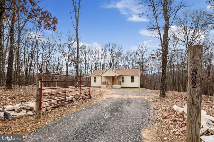 This newer single level living home has so much to offer! It is a 2 bedroom and 2.5 bath home with an unfinished, walk-out level basement that is ready to be finished off to make more bedrooms or living space. The open floor plan is great for gatherings and making memories. Upon entry is the large living room area that leads into the kitchen/dining combo. Granite countertops throughout the kitchen counters and breakfast bar/island. The expansive primary bedroom has a walk-in closet and a bay window perfect for relaxing and enjoying the mature trees and winter mountain views. En suite bathroom is complete with granite vanity and a huge walk-in shower with dual shower heads. The first level is finished off with the second bedroom, laundry room with wash sink and a half bath. Downstairs is an unfinished, walk-out level basement with a second fully functional bathroom currently being renovated. There is a ton of potential in the basement and double walkout doors leading to the back yard. This home has been perced for 3 bedrooms and documents are available. Schedule your showing today so you don’t miss out on this one!!