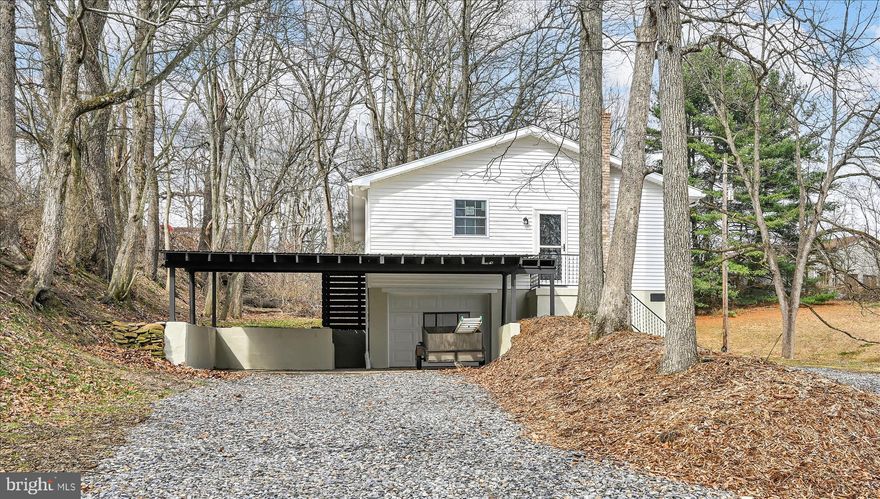 Tucked away on a private and peaceful .92-acre lot, this beautifully renovated 2-bedroom, 1-bath home offers the perfect blend of modern updates and comfortable one-level living. Fully updated from top to bottom, this move-in ready property features a brand-new roof, windows, and siding—giving you peace of mind for years to come.

Step inside to find a bright and inviting kitchen filled with natural light, complete with butcher block countertops, a brand-new sink, and stylish backsplash. The home also boasts all-new flooring throughout, along with ceiling fans in every room for added comfort. Updated bathroom with a brand-new sink, toilet, and tub/shower, and the ease of true one-level living. The partially finished basement provides additional living space and includes a cozy wood-burning fireplace, new drop ceiling, and includes two washer and dryer hookup—perfect for flexible living arrangements or extra functionality. This home  includes an attached one-car garage plus a car port. Private Driveway.
If you’re looking for a quiet setting with modern upgrades already done, this home is a must-see!