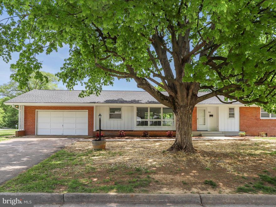 Come see this lovely remodeled brick rancher next to War Memorial Park in Martinsburg. This 3 bedroom 2 bath home has been updated and features a finished basement. Updates in 2024 include remodeled kitchen with new cabinets, granite countertops and LVP flooring. The refinished hardwood flooring sparkles throughout the rest of the main level living areas. Outside you will find a small patio with a flat rear yard on .24+/-  city lot. The new roof and gutters finish off this classic Martinsburg home.