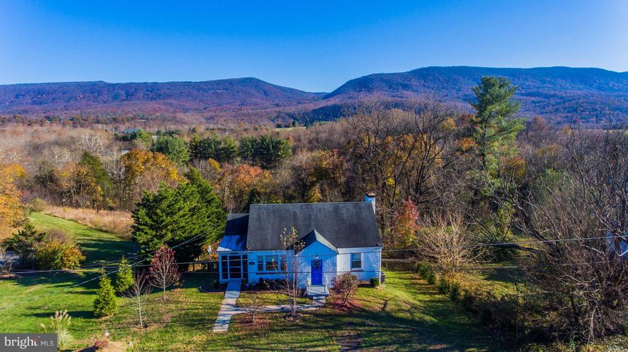 *Spectacular views from this renovated cottage with frontage on Stoney Creek and just moments from the Shenandoah River!  Enjoy the outdoors from the screened porch or the lower level patio with pergola.  Finished attic/3rd bedroom plus finished lower level that includes huge rec room, den/office and laundry/full bath.  Perfect home located on the edge of town, just minutes away from I-81.