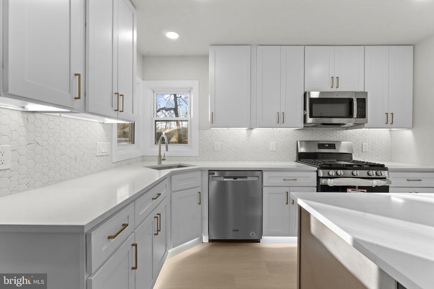 ***** OPEN HOUSE SUNDAY  JANUARY 11TH    12-3PM *****

Discover this remodeled single-family home at 9603 Woodland Ave, nestled in the Sherman Park neighborhood of Lanham.. This beautifully updated property offers three comfortable bedrooms and a full bathroom upstairs, where natural light and thoughtful design meet modern convenience. The kitchen boasts brand-new warm-toned cabinets illuminated by recessed LED lighting, with a stylish island topped by pendant lights — perfect for casual meals or gathering as well as stainless steel appliances and a sink overlooking at the fenced in yard! 

Downstairs, the open basement expands your living options with two additional spacious rooms, a full bath complete with a bathtub, an electric fireplace, and a wet bar — ideal for entertaining, a guest suite, or a home office. Built-in speakers throughout the home add a touch of sophistication to everyday living. Outside, a new roof and siding give the home curb appeal and long-term durability, while a concrete driveway ensures ease of parking. 

Located in Lanham, you’ll enjoy quick access to major thoroughfares including Maryland Route 450 and Interstate 495, making commuting or travel around the region effortless. Whether you’re drawn by the open-concept basement, modern kitchen and bath upgrades, or the convenient location close to major roads and local amenities, this home blends comfort, style, and practicality.