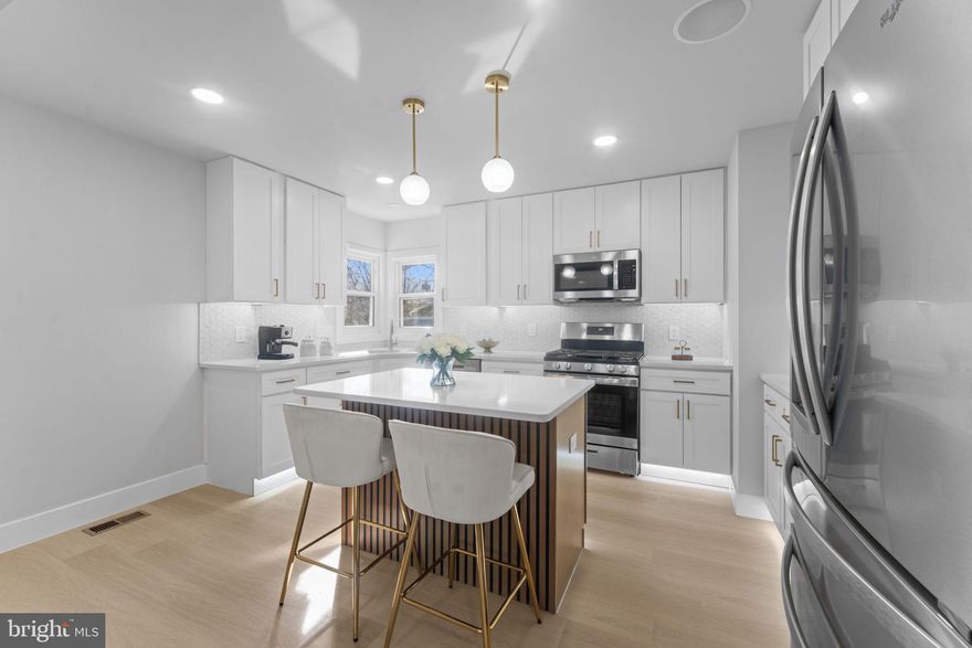 **** OPEN HOUSE SUNDAY MARCH 8TH FROM 1-3PM *****

Discover this remodeled single-family home at 9603 Woodland Ave, nestled in the Sherman Park neighborhood of Lanham.. This beautifully updated property offers three comfortable bedrooms and a full bathroom upstairs, where natural light and thoughtful design meet modern convenience. The kitchen boasts brand-new warm-toned cabinets illuminated by recessed LED lighting, with a stylish island topped by pendant lights — perfect for casual meals or gathering as well as stainless steel appliances and a sink overlooking at the fenced in yard! !

Downstairs, the open basement expands your living options with two additional spacious rooms, a full bath complete with a bathtub, an electric fireplace, and a wet bar — ideal for entertaining, a guest suite, or a home office. Built-in speakers throughout the home add a touch of sophistication to everyday living. Outside, a new roof and siding give the home curb appeal and long-term durability, while a concrete driveway ensures ease of parking. 

Located in Lanham, you’ll enjoy quick access to major thoroughfares including Maryland Route 450 and Interstate 495, making commuting or travel around the region effortless. Whether you’re drawn by the open-concept basement, modern kitchen and bath upgrades, or the convenient location close to major roads and local amenities, this home blends comfort, style, and practicality.