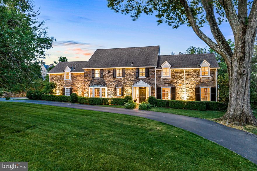 The gem you have been waiting for is finally available! Set on one of North-side Haverford's most coveted streets within a stunning, quiet, walk-to-everything neighborhood, this beautifully renovated and timelessly decorated Walter Durham home awaits its new owners. Endless features include bright sun-filled windows throughout overlooking breathtaking gardens, graciously proportioned living with fireplace and dining room with perfectly refinished original oak floors, classic millwork, moldings and built-ins,  renovated gourmet kitchen with white custom cabinetry, farm sink, Subzero refrigerator/ freezer, Bosch dishwasher and Italian Bertazzoni gas range, spacious walk-in mudroom/ pantry, adjacent family room with oak floors and built-ins off of the bright kitchen, fabulously renovated and expanded primary suite with Carrara  marble bathroom, frameless glass shower, soaking tub and walk-in dressing room with extensive custom closets, 3 additional second floor bedrooms with en-suite and Jack and Jill bathrooms, optional 5th bedrooms on the second and finished 3rd floor levels and a partially finished bonus room in the lower level. The flat, private .66 acre lot also features an expansive front and rear lawn, large rear terrace with wood-burning stone fireplace, circular front driveway and plenty of extra parking off of the side garage entrance. Walk to local and Amtrak trains, wonderful clubs, incredible restaurants, shopping, Suburban Square, Bryn Mawr, Haverford and Ardmore. Close to renowned private and Lower Merion Schools, endless colleges and universities, Center City Philadelphia, Philadelphia International Airport, golf courses, hiking and riding trails and more. Move right in!