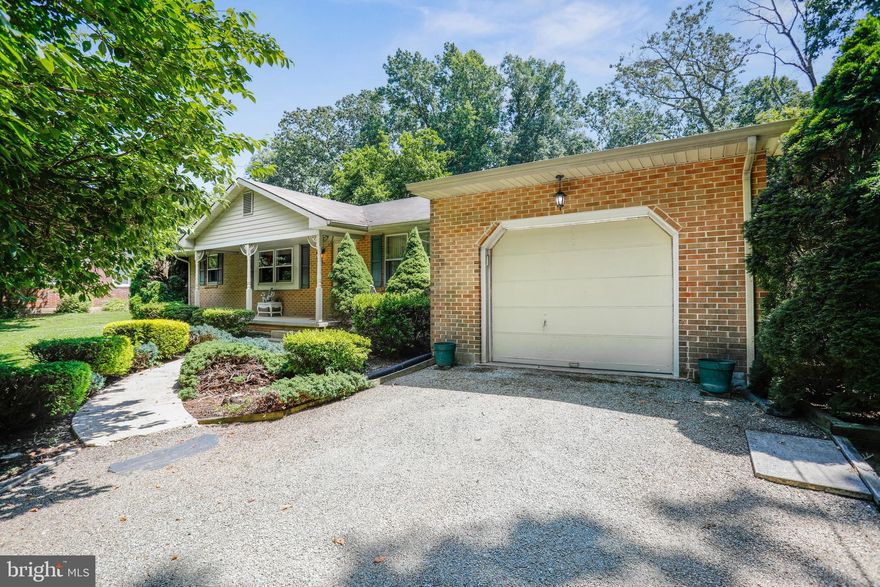 GORGEOUS BRICK RANCHER ON ALMOST 1 ACRE OF LEVEL GROUND WITH HARDWOOD FLOORS AND NEARLY 1700 SQUARE FEET ON THE MAIN LEVEL. LOWER LEVEL HAS SOME AMAZING WORKSPACE AND STORAGE AS WELL AS A REC ROOM. SPACIOUS LIVING ROOM, 3 BEDROOMS, DEN, OPEN EAT -IN KITCHEN. FAMILY ROOM AND SUNROOM OFF KITCHEN! STAINLESS APPLIANCES.  IN ADDITION TO THE 1 CAR GARAGE, THE HOME FEATURES A HUGE DETACHED 2-CAR GARAGE WITH BONUS ROOM ABOVE.  NEW WELL PUMP, SEPTIC, AND WATER HEATER IN 2021.  LOTS OF OPPORTUNITY HERE.