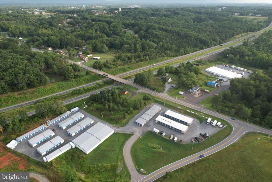 Sunburst Storage is a three-parcel self-storage and industrial assemblage offered at $5,470,000 on 13.368 acres with 52,022 sq. ft. of storage space include (parcels 206, 209, and 210, also known as 1605 and 81 Sunburst Rd). 

195 Standard (drive-up units), 135 climate control units, 79 parking spaces (3 are parking lots). 

The property offers storage plus RV, boat, semi, and vehicle storage. Improvements include 19 storage buildings, build 2014-2023, a separate office, a fenced secure compound, and an apartment above the office currently operated as an Airbnb. Zoned I-G (Industrial-General). Upside includes an additional 8.520-acre cleared parcel with land improvements and a stormwater pond for expansion. Positioned along US 460 with quick access to Routes 29 and 501, approx. 7 minutes to Wards Rd. and Liberty University. Near the Wards Rd commercial corridor and River Ridge Mall, supporting steady consumer and business activity. Strong multi-income potential with superior land improvements and room to grow. Well maintained and professionally improved.