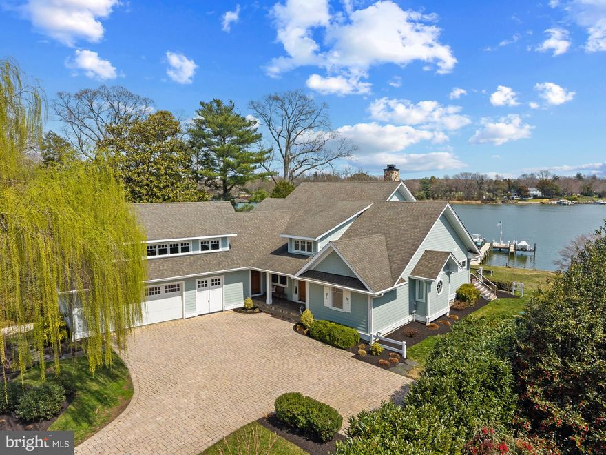 Welcome to a thoughtfully designed waterfront home on Whitehall Creek, where elevated positioning, wide open views, and a private deep-water pier with approximately 12 feet of mean low water, define the experience from the start.

Step inside and the water immediately becomes the focal point. Natural light fills the home, and open sightlines carry those views throughout the main living spaces, creating an easy connection between indoors and out.

With five bedrooms and four and a half baths, the layout is well suited for both everyday living and hosting. The kitchen, living, and dining areas come together naturally, each oriented toward the creek.

The main-level primary suite offers privacy and a quiet sense of retreat, with a spacious bath, oversized walk-in closet, and direct access to a private porch. It’s a place to begin the day with sunrise over the water and the steady rhythm of life along the creek.

Upstairs, two additional bedrooms are complemented by a flexible space that can easily serve as a sixth bedroom if desired. Above the garage, a separate guest suite provides comfort and privacy, complete with two walk-in closets and a full bath.

The lower level continues the living space with a fully equipped in-law suite or private apartment, including its own kitchen, living area, fireplace, and continued water views. There is also ample storage and the opportunity to expand additional finished space over time.

Outside, the setting is both inviting and practical. Landscaped grounds, a secondary driveway for additional parking, and easy golf cart access to the waterfront make day-to-day living feel effortless. A screened porch off of the kitchen offers a natural place to gather, dine, and take in the breezes coming off the Chesapeake.

The private pier is built for boating, with power, water, and two lifts (8,000 lb and 15,000 lb), offering direct access to the surrounding waterways for boating, crabbing, and fishing.

Well maintained and thoughtfully positioned, 1787 Beachfield represents a complete and increasingly rare waterfront offering on Whitehall Creek.
