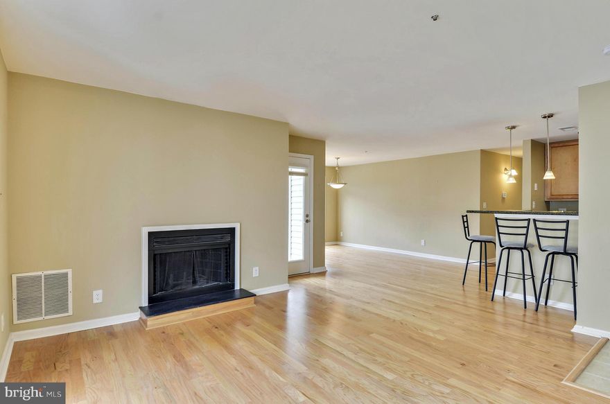 Best Value! Move-in Condition! 2BR & 2BA, HW floors,FP, Granite Counters in Kitchen & Bathrooms, Full Size W/D, Newer HVAC, Upgraded SS Refrigerator. Elevator Building, 4th flr, Separate Dining area & kitchen counters for bar stools, balcony,Community Pool & Gym, dog park next to building. Metro Bus, Vienna Metro. FHA approved. Enjoy Oak Marr Park. Close to Rt. 66. Close to Vienna & Tysons Corner.