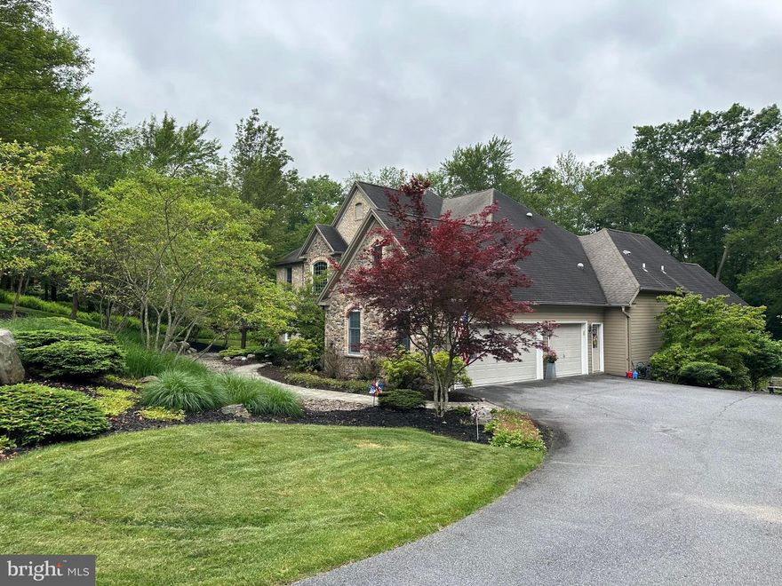 This exceptional stone and brick lakefront home offers the perfect blend of peaceful retreat and convenient access, located just 2 hours from both Philadelphia and New York City, making it an ideal full-time residence or luxurious weekend escape.

Nestled in a tranquil setting in the highly desirable Ice Lakes community, this classic brick lake house captures the beauty of nature with breathtaking lake views and the soothing sound of a charming babbling stream that runs along the property. The stream offers the unique opportunity to launch kayaks, canoes or small boats directly into the lake, creating an unmatched connection to the outdoors.

Inside, the home is filled with natural light and showcases gorgeous hardwood floors throughout, enhancing the warm and inviting atmosphere. The thoughtfully designed layout features two primary suites — one on the main level with stunning lake views, and a second upstairs providing privacy and flexibility for guests or multi-generational living.

The dramatic two-story family room showcases spectacular lake views and is anchored by a beautiful stone hearth gas fireplace. A second gas fireplace creates an elegant focal point in the music room, also perfectly suited as a formal living room.

The spacious kitchen is designed for both everyday living and entertaining, featuring an oversized island, upgraded cabinetry, charming window seats, and a butler’s pantry. Formal living and dining rooms provide wonderful gathering spaces, while the cozy screened porch offers peaceful lake views — perfect for morning coffee or relaxing evenings.

The finished daylight basement has access to the yard, adds valuable living space and is already framed for a fifth bedroom and plumbed for a full bath, offering excellent potential for guests, a home office, gym, or recreation area.

Additional highlights include a three-car garage and a large deck ideal for entertaining or simply enjoying the tranquil surroundings.

Whether you are seeking a serene primary residence or the perfect vacation getaway, this extraordinary lakefront home offers the rare combination of luxury, comfort, and convenience — all within easy reach of Philadelphia and New York City. (professional photos coming soon!)