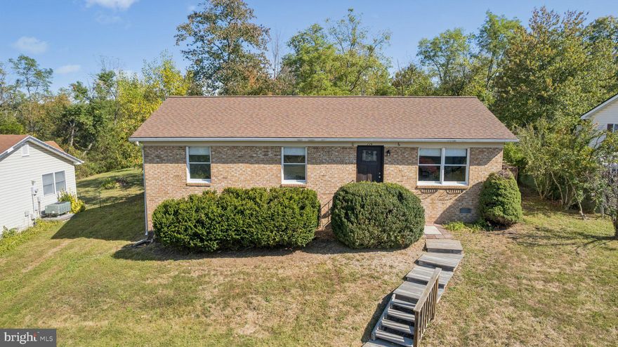 Owner has contracted for a single lane driveway to be installed to avoid the steps leading to the home!!!! Welcome home to this beautifully updated 3-bedroom rambler, perfectly blending comfort, style, and convenience. Step inside to find hardwood floors and an inviting eat-in kitchen with abundant cabinetry and stainless-steel appliances. Recent upgrades include a newer roof and a new mini-split HVAC system, with electric baseboard heat as a backup for added peace of mind.
The fenced, level backyard offers plenty of space for play, pets, or gardening, complete with a storage shed and peaceful wooded common area views. A deck provides the ideal spot for relaxing or entertaining.
Perfectly located just minutes from shopping, dining, and I-81, this home also offers easy access to Sherando Park, the Bowman Library’s Story Walk on Lake Trail, and fishing at nearby Lakeside Lake. A wonderful starter home or downsizing option in a convenient and scenic setting!