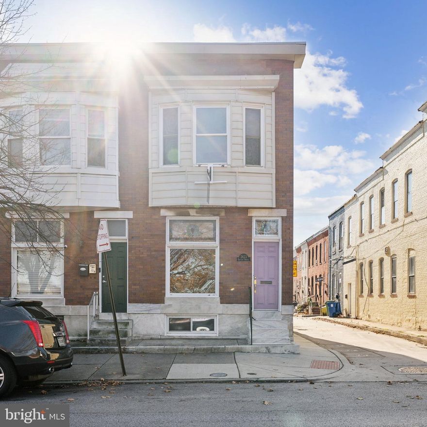 Traditional Highlandtown row home with beautiful original stained glass, energy efficient vestibule with original tile, and parquet floors.  Ideally situated across from Patterson Park, this classic home has been freshly painted and features an updated kitchen,  a main level modern full bathroom with walk in shower, and a stunning second level bath with separate jetted tub and stall shower.  Thanks to its north-south orientation, large windows, and end location, this home boasts abundant natural light from three sides. Homes right on the Park are rarely available- schedule your tour asap!