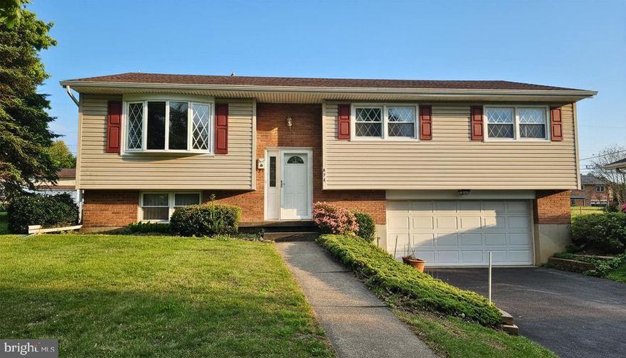 Offered for sale for the first time in over 50 years! Meticulously maintained and move-in ready, this spacious South Allentown bi-level is just waiting for a new owner and some fresh ideas to make it shine once again! A quiet, tree-lined street provides a peaceful homesite, while conveniently located to all major routes, shopping and dining. As you enter, you're welcomed by the warm and inviting hardwood floors, accented by the natural light gleaming through the updated windows. The dining room is centrally located between the living room and kitchen providing exceptional entertaining options. In the kitchen you'll find ample cabinet and countertop space with updated appliances and access to the rear yard. Allow the hardwood floor to guide you down the main hall to find 3 generous sized bedrooms and the large full bath with custom cabinetry, and water closet. Additional living space can be enjoyed in the partially finished lower level rec room and large windows and plenty of storage. With some finishing, the laundry room with second toilet could be easily converted to a half bath.  The oversized, attached garage features electric overhead opener plus extra storage space. Efficient CENTRAL  AIR with electric heat pump will keep you comfortable year round. The flat, sprawling rear yard provides endless opportunities for outdoor enjoyment of all kinds!