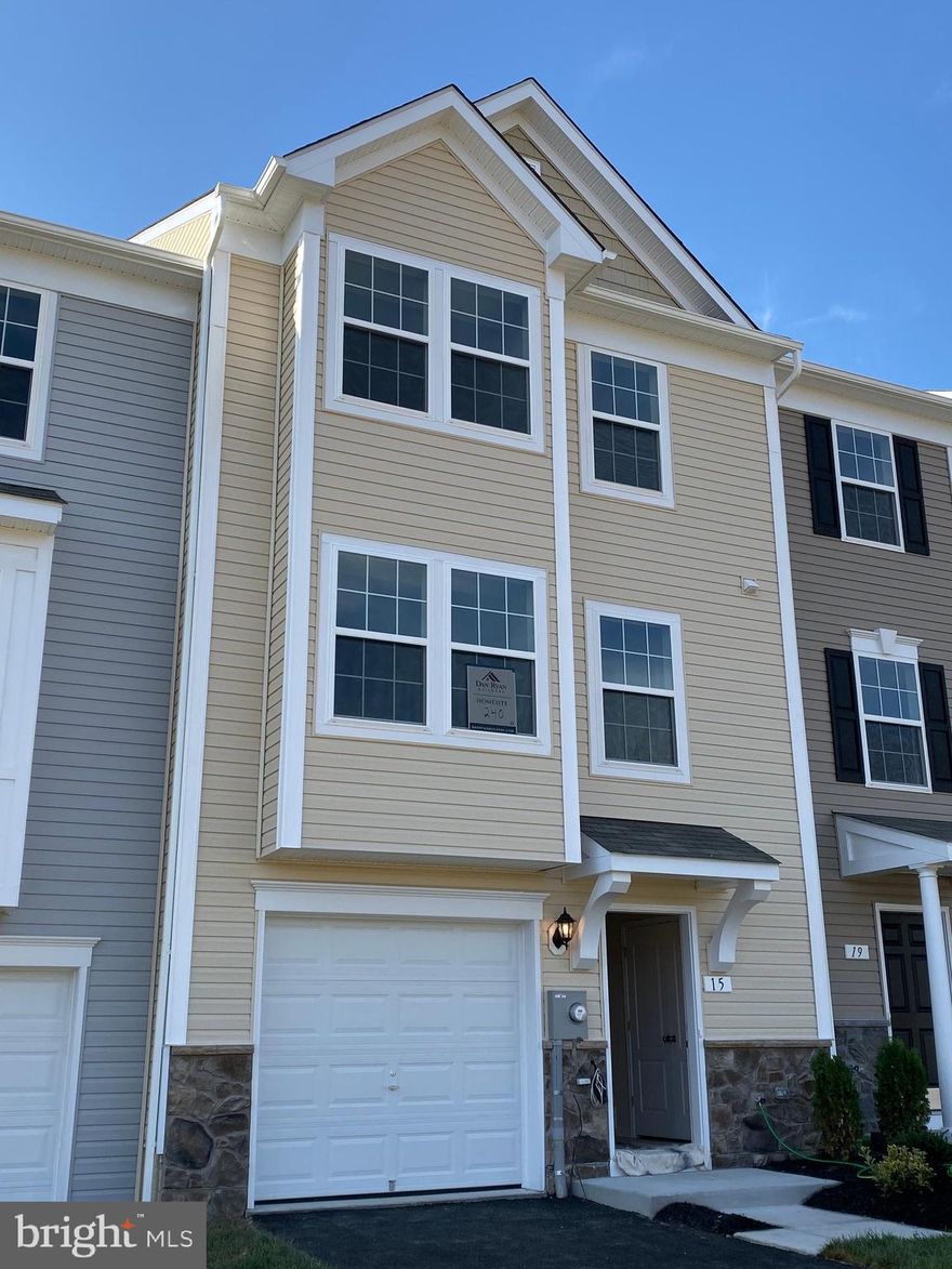 READY NOW! MOVE-IN ASAP!  100% FINANCING & CLOSING COST MONEY!  Closing cost assistance available! York II garage town, INTERIOR UNIT, stainless appliances, , 42" cabinets & kitchen island, finished lower level rec room with walkout & 1/2 bath. *actual home may differ from photos* **PENDING RELEASE OF CURRENT CONTRACT**