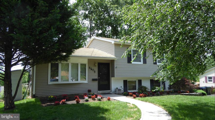 Expanded Split Level with Family/Sun Room Addition...Room to Spread Out...Hardwoods, Updated Kitchen, Upper Level Deck andPatio at Rear of Home.  Finished Lower Level has Bath and Recreation Room with Built In Desk and Bookcases.  Located on Private Site - Close in Alexandria..Home also for Sale...Contact Alt Agent