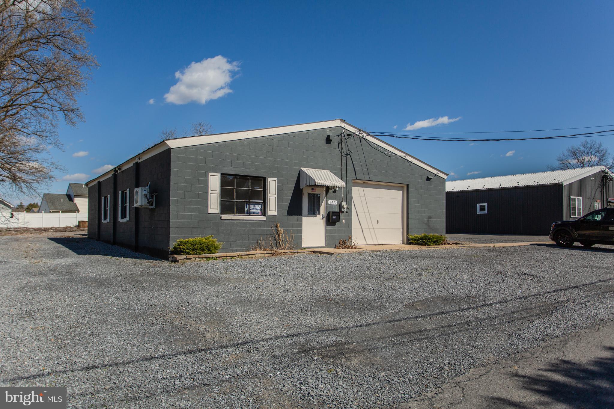 Welcome to 653 Lincoln Way West—a versatile 1,840 sq ft commercial property ideally positioned on one of Chambersburg’s most traveled corridors. This property offers both functionality and potential in a location that blends high visibility with local charm.
The property sits across two tax parcels (05-1B55.-054.-000000 and 05-1B55.-054B-000000), providing added flexibility for future development, expansion, or outdoor enhancements such as additional parking or exterior seating. With a well-maintained exterior and timeless architectural details, the building invites possibilities for a range of business uses.
Inside, you'll find a spacious and adaptable layout complemented by one full bath—convenient for both clients and staff. The open floorplan allows for easy customization to suit your business needs, whether you're reconfiguring for private offices, a collaborative workspace, or a welcoming retail floor.
Positioned just minutes from downtown Chambersburg and surrounded by a mix of residential and commercial neighbors, this location ensures steady foot traffic and easy access to major routes. The additional lot expands your vision, offering the rare ability to grow without relocating.
Whether you’re an investor building your portfolio or an entrepreneur searching for a strategic location, this property stands out as a smart, long-term play in a growing market. Thoughtfully maintained, centrally located, and full of potential—653 Lincoln Way West is ready for what’s next.