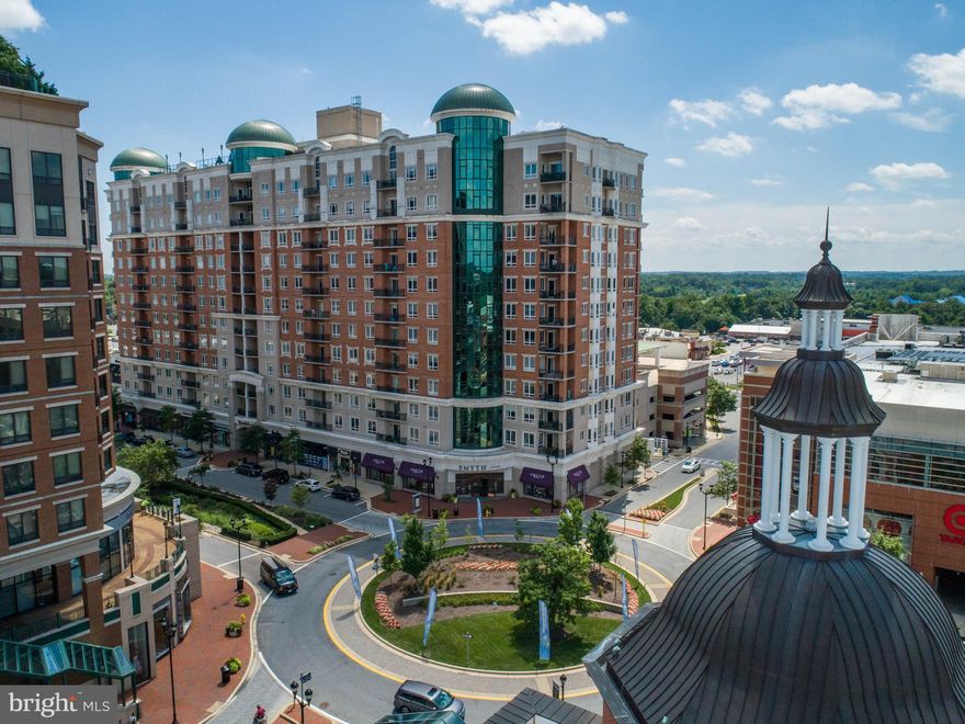 Experience the epitome of upscale living at The Grandview at Annapolis Towne Centre, where luxury, convenience, and an enviable location come together.  Nestled just steps from shops, restaurants, grocery stores, and entertainment venues  for unbeatable convenience and access to everything you need. Residents at the Grandview also enjoy exclusive access to an array of private amenities, including a 24/7 concierge team, fitness center, rooftop pool, rooftop grilling area, lounge, fitness center and secure parking garage. The garage also has EV charging stations.  Upon entering this bright and airy 10th floor residence, you're welcomed by an abundance of natural light and views for miles. This well maintained  home has 2-bedrooms and 2 full bathrooms plus a home office/bonus room with French doors. The living spaces feel open with 9 ft and 10 ft ceilings, including tray ceiling and floor to ceiling windows with upgraded UV film. The kitchen features a sleek, modern design with newer stainless steel appliances, granite countertops, a breakfast bar with space for stools plus a space for your kitchen table.  The open-concept layout with a combined family/dining room provides the perfect setting for hosting gatherings or enjoying cozy nights in. Enjoy your morning coffee from the balcony just off the dining area. The spacious primary bedroom boasts a luxurious en-suite bath, complete with dual vanities, a soaking tub, and a separate shower.  An additional bedroom, full bathroom, and laundry room complete the living space. The Grandview's prime location offers easy access to major highways, making it an ideal spot for commuters. It's just minutes from downtown Annapolis, Westfield Shopping Mall, and Anne Arundel Medical Center.  2 parking spaces convey.  **Recent updates include: Water heater (2024),, Garbage disposal (2024), Washer/Dryer (2023), HVAC with Ultraviolet light (2022) which is maintained with an annual contract , Kitchen appliances (2022) , Additional closet shelves (2014), Plantation Shutters in bedrooms (2013)** You will appreciate the unmatched ease and sophistication of living here.