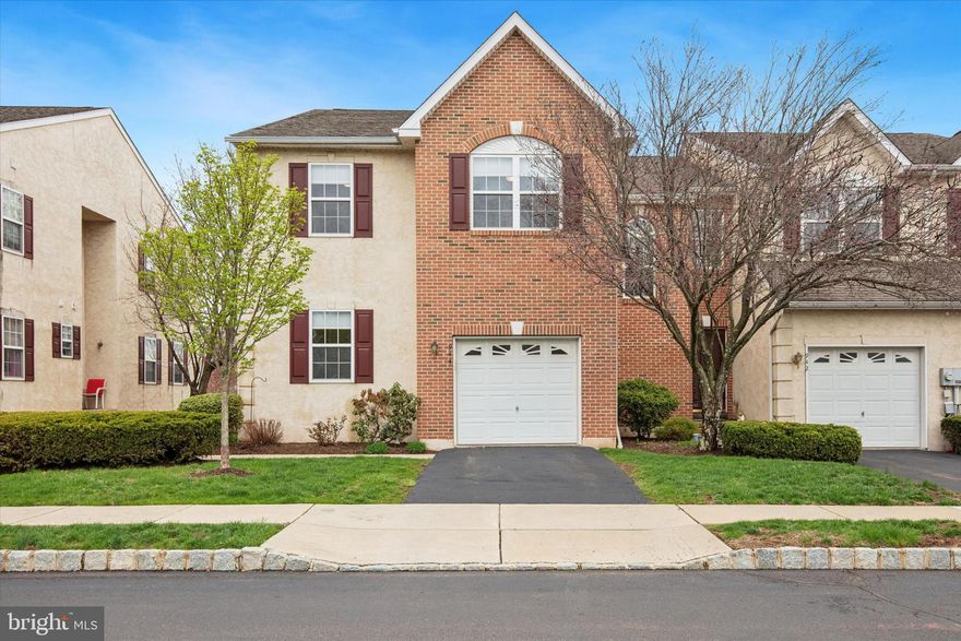 Here is your chance to own a Preston Court end unit townhouse in the borough of Red Hill.  Great townhouse in Blue Ribbon, Upper Perkiomen SD, Preston Court is a delightfully well maintained community in Upper Montgomery County. This spacious, 3BR, 2.5BA, with fully finished basement home is a pleasure to show. Upon entering, the two-story foyer has large windows allowing for plenty of natural light. The large eat-in kitchen has expansive counter surfaces for food prep, and is open to the dining and living room areas, both with newly installed carpet, allowing for easy interaction with guests. The gas fireplace is perfect to take the chill out of the air on cooler evenings. The sliding glass doors lead to the deck with amazing views of the Macoby Creek area and woods! Don't forget about the flex space on the first floor that can be utilized for an office, playroom, gym, etc..  A powder room completes this level for guest convenience.  The entire second level has been updated with new wall to wall carpeting. The spacious primary suite has vaulted ceilings, sitting area, walk-in closet and a large private bath with a stall shower, double vanity and soaking tub. The two secondary bedrooms are well proportioned and share a hall bath. There is a very sizable linen closet and a conveniently located laundry area with hookup for either gas or electric dryer. The newly finished walkout basement provides additional living space and access to the outdoors with a newly installed paver patio, while the deck offers peaceful views of the surrounding trees, with a park directly behind for extra privacy. The home includes a one-car garage with additional driveway parking. There is also ample overflow parking around the community. This home offers an easy commute with access to major roads such as Rt. 100, Rt. 29, Rt. 663 and the PA Turnpike. Close to schools, shopping and dining, it provides a vibrant local lifestyle.  Residents enjoy easy access to parks, walking trails, golf courses and recreational facilities. New furnace 2020,  hot water heater 2021, new washer/dryer 2025.