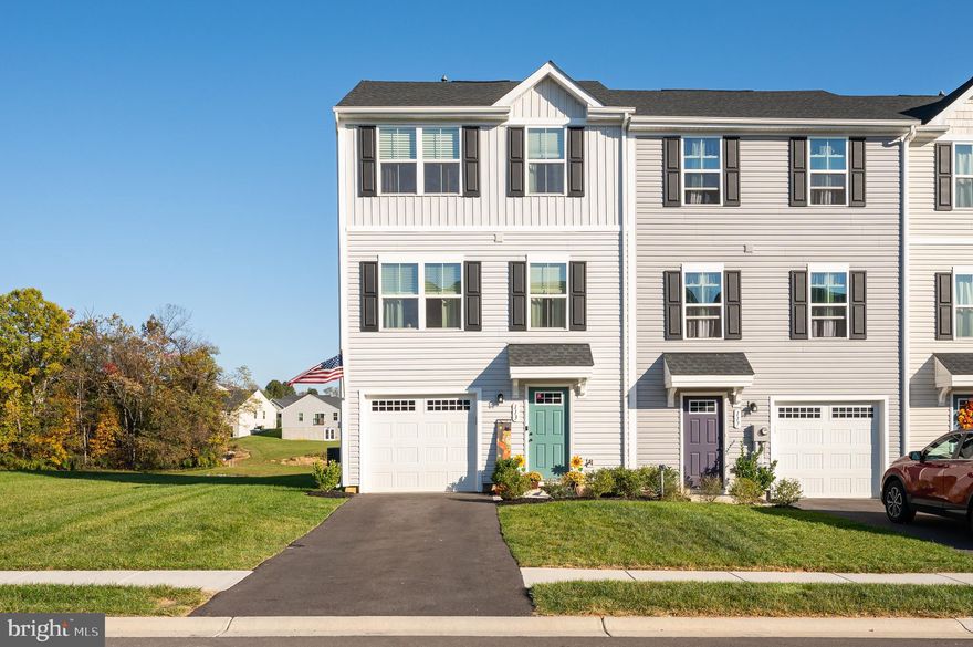 This stunning nearly new end-unit townhome, located in the sought-after community of The Lakes at Martinsburg, offers 3 bedrooms, 2.5 bathrooms, and a finished lower-level rec space, ideal for additional living, office, or entertainment. Situated on a prime lot with a deck overlooking serene open space and a pond, this home provides extra privacy and peaceful views. Conveniently located less than 10 minutes from I-81, it's close to shopping, restaurants, schools, and medical centers for easy commuting and daily living. The community boasts numerous amenities, including a covered pavilion, playground, walking trails, and a dog park. Inside, the home features an open-concept kitchen, living, and dining area with , an island, and stainless steel appliances. A convenient half bath is located off the main living area. The primary bedroom includes a walk-in closet and a private ensuite bath, while the second and third bedrooms share a full hall bath. Laundry is located on the bedroom level for added convenience, with a washer and dryer included. This gas community offers everything you need for modern, comfortable living. Schedule your tour today!