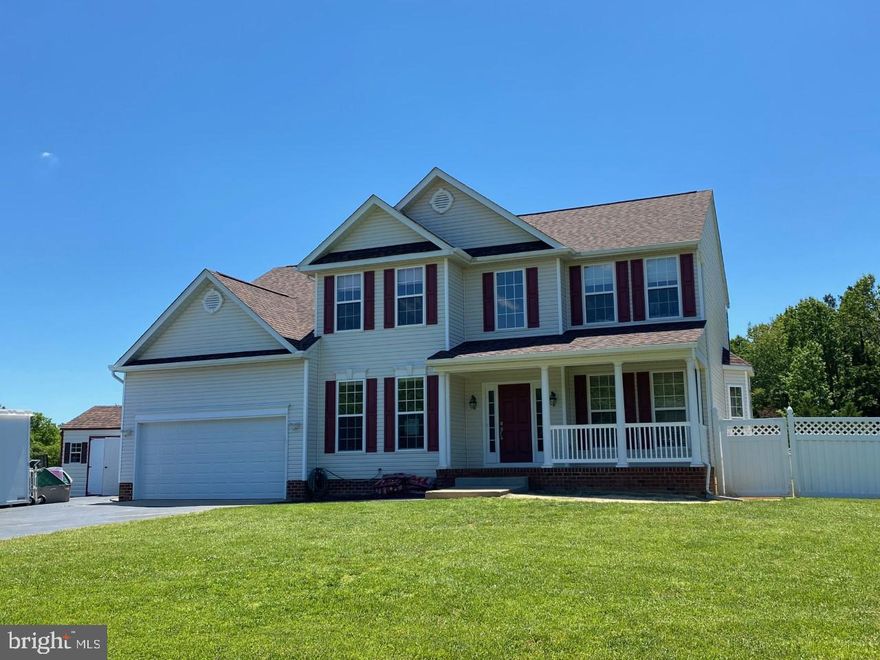 Lovely colonial  on 1.7 acres... Roof replaced in 2018, HVAC units replaced in 2015 w/ gas back up. House has been freshly painted, new carpet.  Kitchen was updated in 2017 with granite counters, new flooring and stainless appliances.    Buried 500 gallon tank owned by seller.  Gas services back up heat, fireplace, stove, hot water heater & dryer.  Two laundry rooms, one on main level & one in basement. Lawn sprinklers in front & side yard.  Back yard has a vinyl privacy fence with a 35 x 15 above ground pool with maintenance free decking.  Trex deck with vinyl rails. Front porch.  Beautiful corner lot.