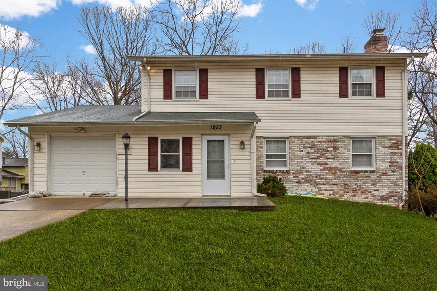 Who wants a short commute?  Everybody! The best of both worlds. Convenience of nearby Tyson's,  Rt 7, and 495 yet home sits on a quiet street. Brick and siding Colonial with one car garage. Four Bedrooms on top floor.  Hardwood floors on main and upper levels.  Spacious Living Room with mantled wood-burning fireplace.  Formal dining room and eat-in kitchen with newer Stainless Steel Refrigerator and Double ovens. Family Room off kitchen.    Enjoy warmer weather on deck and large flat yard; .29 acre lot.  Recreation room and huge storage room in basement. Mud room.  Extra storage room in garage. Near newly constructed upscale homes. Within walking distance to Tyson's Corner Mall and Rt.7. Sold As-is. Ready for your personal touches to make it shine!