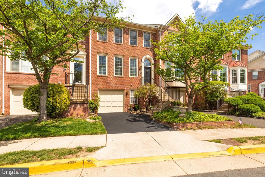 Welcome to 6240 Windham Hill Run, a fabulous 3-bedroom 3.5 bath brick-front Shelley model with bump-outs on all three levels and backing to woodlands in Alexandria’s popular Kingstowne. A custom elevator whisks you to all three levels. A large 1-car garage will keep your car in pristine condition. There’s an open floorplan with classic hardwoods on the main level, upper hall and in the owner’s suite. New carpet has been installed in the two other bedrooms. The entire home has been freshly painted. The foyer is brightened by a Palladium window above the entrance door. There is elegant crown molding in the living and dining rooms and the dining room also has a ceiling medallion. The kitchen features rich cabinetry, a tile floor, sleek granite counters and a double-sink with a swan-neck faucet. There’s a spacious deck off the breakfast room which features three windows overlooking the canopy of trees. The family room off the kitchen has a double window. Upstairs, the owner’s suite has a soaring vaulted ceiling and a sitting room bump-out with a wall of windows and uninterrupted view of trees. The owner’s bath has a dual-sink vanity, a soaking tub and separate shower and recessed lighting. On the lower level, you’ll find a full bath, the oversized laundry/storage room and a terrific rec room with its inviting gas fireplace with a marble surround and detailed wood mantel. From the rec room - step out to the fully-fenced rear yard. This beautiful home comes with the endless list of Kingstowne amenities - pools, gyms, community centers, sport courts, tot lots, 12 miles of walking trails and more! It’s also close to two Metro stops, two town centers and all commuter routes!