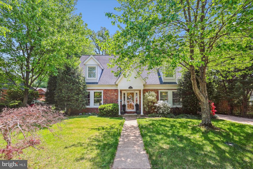 Deadline for OFFERS DUE Tues 9am.  *WELCOME* to this STUNNING 5-bedroom, 3.5-bath home that beautifully blends classic charm with contemporary design. With over 4,000 square feet of finished living space and a rare 4-car garage with ample storage, this home offers both elegance and everyday comfort.  Nestled in the heart of Falls Church City, the home features an expansive, light-filled main level—ideal for both family living and entertaining. Step into the inviting foyer and you’ll find a charming living room with a cozy fireplace, a dramatic open staircase, and French doors leading to the formal dining room. Just off the living room, a versatile den or fifth bedroom offers flexible space to suit your lifestyle.  The thoughtfully renovated kitchen is a chef’s dream, showcasing generous cabinetry, quartz countertops, an oversized peninsula, stainless steel appliances, a sunny breakfast area. Additionally, there is a mud room off the kitchen and a convenient half bath down the hall.  At the back of the home, the spacious family room features a central fireplace flanked by sliding doors—creating a warm, welcoming focal point.  Adjacent to the family room is a bright and airy office with large windows, two sets of French doors, and a charming brick accent wall overlooking the private backyard—perfect for working from home or relaxing in peace.  Rounding out the main level is a stunning sunroom, complete with expansive windows, skylights, and a gas fireplace—an ideal spot to unwind on a starry summer night.  Upstairs, you'll find four generously sized bedrooms, including an expansive primary suite with skylights, a huge sitting area with a wall-of-windows and skylights, two walk-in closets, and access to a private loft. The spa-like primary bath has been beautifully renovated with custom tilework, heated flooring, quartzite finishes, a walk-in shower, freestanding soaking tub, and dual-sink vanity.  One of the additional bedrooms offers access to a finished attic space—perfect for a office, guest retreat, or extra storage. In addition, this level features a generously sized bedroom with vaulted ceilings and skylight, offering direct access to the beautifully updated primary bath. The laundry room is located on this level.  Step outside to your own backyard oasis, featuring a patio, kitchen garden with herbs, strawberries, and tomatoes, as well as a vibrant flower garden.  All of this, just moments from Metro, FCC farmers market, parks, bike trails, and highly rated Falls Church City schools.  This home truly has it all—style, space, and an unbeatable location. Come see it for yourself!