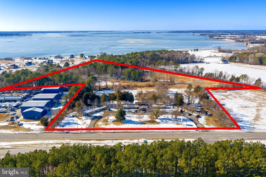 Amazing investment opportunity!! 23.06 Acres of commercial property situated with 500 +/- ft. of direct frontage along busy Rt. 50 with 30,000+ AADT. Located less than 2 miles from Cambridge, this versatile property features 3  ingress / egress points and is zoned Limited Commercial (LC), which is characterized by low intensity commercial neighborhood-oriented businesses. There is existing well and septic in use on the property. This is a phenomenal opportunity to acquire significant acreage along Rt.50.