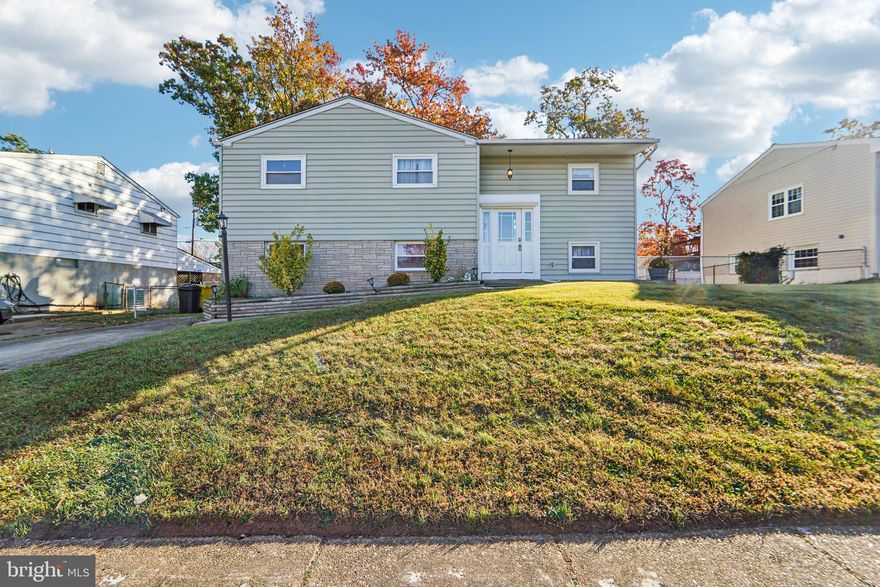 Personality Plus! Fully remodeled Twin Ridge beauty. New kitchen with soft white cabinetry, granite counters and designer backsplash. Open floorplan to the living and dining area plus the deck for that morning coffee or alfresco dining under the stars. New hardwood floors on the first floor and new carpet on the lower level. Both bathrooms are new with upgrade ceramic tile and accents. Replacement windows, doors, and newer roof. The lower level has lots of possibilities with the bedroom, full bath and family room. In-law suite? Work from home space? Party central? Man Cave? Flex the space to your needs. The lower-level walks out to the patio and fenced rear yard. Recent new high efficiency water heater and basement waterproofing with battery back up sump pump. The entire home has been thoughtfully remodeled and updated. All this and a convenient location. Route 100 and Ritchie Highway are very close (yet far enough). Shopping and parks are zippy fast and plentiful. Baltimore and Annapolis are within a short drive, offering more entertainment and shopping venues. All of this in an established lovely neighborhood that is tucked away from the hustle and bustle. What a wonderful place to call home!