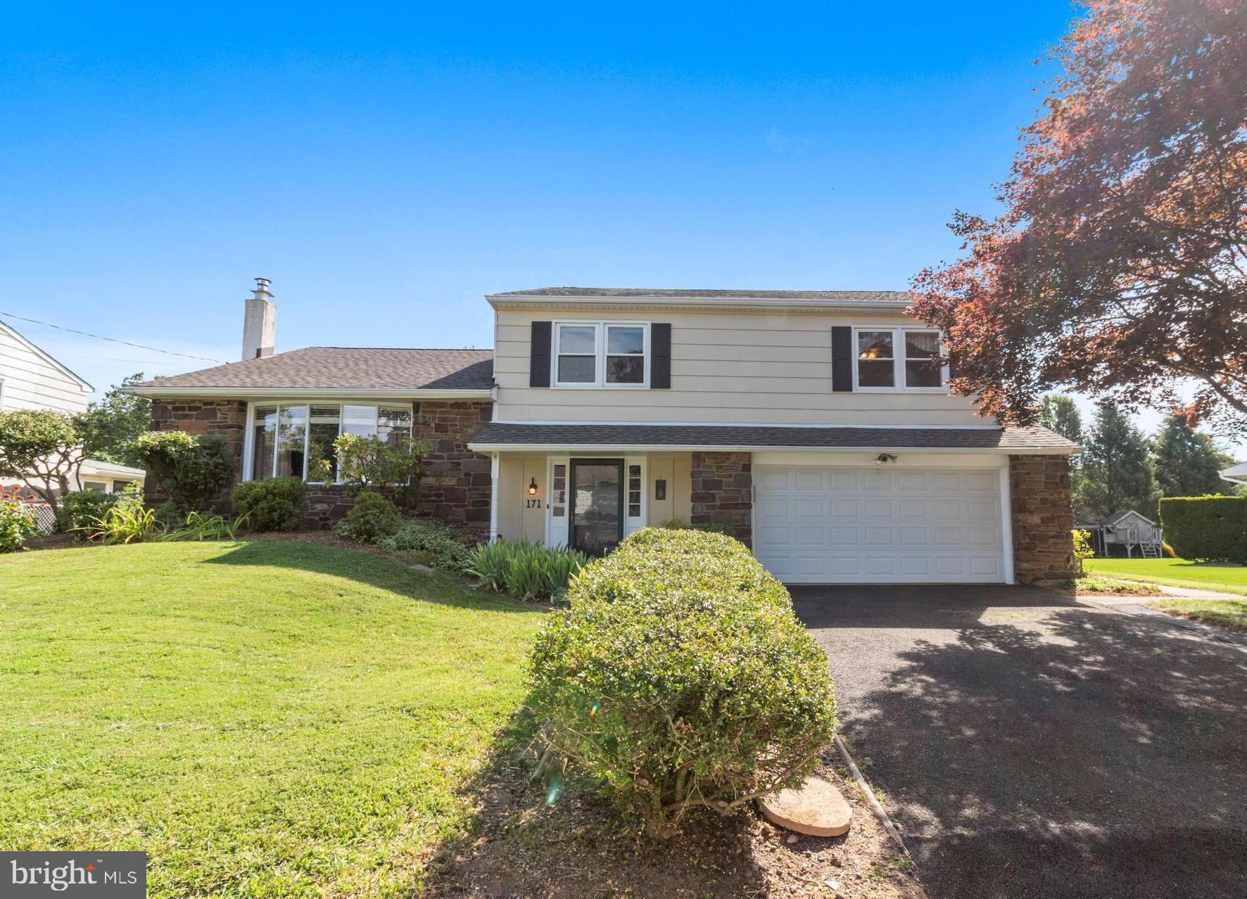 Looking for more space?  Consider this delightful 4 BR, 3 Bath Residence with finished basement and sun room on a private, fenced 1/4 acre lot with attached garage in the "Hedgerow Woods" community.  With an ideal location close to all commuting routes and within the highly acclaimed PENNSBURY school district, this wonderful home is sure to please!  Features include: Large entry foyer with coat closet. Generously sized formal living room w/large bow window & crown molding. Formal dining room with black iron chandelier on dimmer switch, crown and chair rail molding with a sunny double window. Beautifully remodeled eat-in kitchen w/granite counters and updated appliances open to family room below.  Kitchen features maple shaker cabinetry, under-cabinet lighting, stainless sink under single casement window, pantry cabinet and abundant lighting.  Large family room boasts a commanding stone fireplace with a wood-burning stove to warm up the house on chilly winter nights.  (Remember those?) The delightful sun room features all new windows and doors, has been freshly painted, professionally waterproofed and offers recessed lighting and a ceiling fan. Newer exterior door leads to a 16x12 paver patio w/stone retaining walls surrounded by blooming perennial gardens.  (Note:  vegetable garden beds in side yard =) New 10x12 storage shed in fenced rear yard w/mature arborvitaes providing wonderful privacy. Hardwood floors in living room, dining room, staircases, hall and all bedrooms. Slate floors in foyer, family room, sun room & kitchen. Updated bathrooms:  Hall bathroom w/maple vanity & granite sink top, beautiful tiled floors & tub/shower with tiled surround. Master bathroom has shower stall, white porcelain sink and tiled floor.  First floor full bathroom offers pedestal sink, large shower and tiled floor. Finished basement boasts huge play/cave space w/lots of closet storage, dry bar w/mini-fridge and mini-freezer, abundant overhead lighting, commercial-grade low pile carpeting, freshly painted walls. Laundry room on lower level includes LG washer (NEW) and Maytag dryer (as-is) NEW windows in 2019 (exception living room bow & interior window family rm). NEW boiler and oil hot water heater (2018)  (Above ground oil tank in closet in basement). Newer architectural roof shingles (@7 years).  New garage door opener with exterior key pad. Warm, charming interior w/ earth tones and natural elements:  wood, slate, granite, stone!  Super convenient location: minutes to Route 1, I-95, the PA/NJ Turnpike makes commuting a dream plus local swim clubs, parks, shops, restaurants and the best of historic Bucks County, PA all at your fingertips.  What s not to love?  171 Rice Drive, Yardley IS A wonderful place to call "HOME"