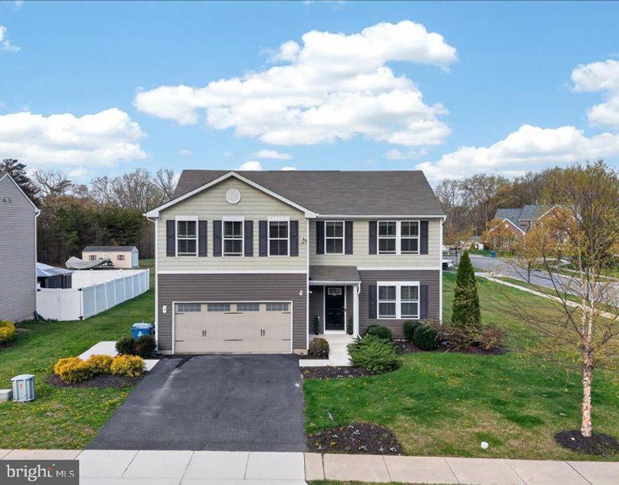 Welcome to 2 Ridgley Forest Drive in Elkton! You are welcomed to the property with low maintenance landscaping and and a quaint front porch. Upon entering the home, the open floor plan is on full display and makes entertaining, dining and living easy. The kitchen boasts stainless steel appliances, dark wood cabinets, custom backsplash and plenty of storage. A half bathroom is also on this level. Upstairs, the primary suite features his and hers walk in closets and a large en-suite bathroom. Four additional bedrooms are also on this level, ideal for guests or an office. A large full bathroom is shared by the bedrooms. The laundry room is also on this level. The unfinished basement has a rough in for a bathroom and an additional 1,000 sq ft of space that can be finished. Outside, the maintenance free deck is ideal for the warmer months and enjoying almost 1/3 of an acre of land on a corner lot. Enjoy the convenience of easy commuting or boating on the Chesapeake Bay just minutes away. The community pool, local marinas, schools, and shopping centers are all nearby. Quick access to Route 40 and I-95 makes this location ideal. Schedule your tour today!