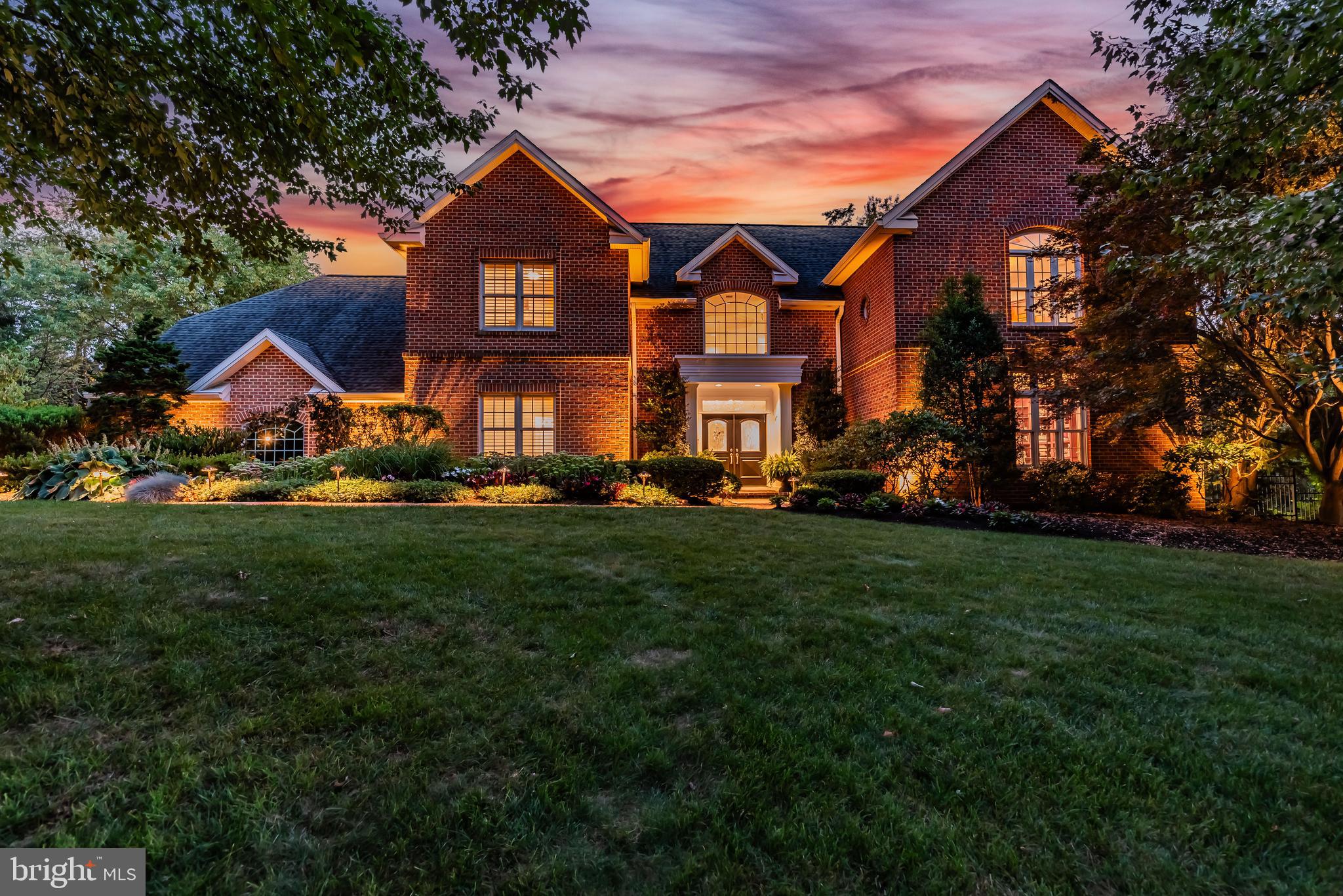 Welcome to your dream home in the prestigious White Oaks neighborhood! This stunning residence, crafted by renowned builder Farinelli, is situated on a lush 1.5-acre lot with over 6,000 SF of finished living space within the sought-after West Shore school district. From the moment you step through the grand two-story foyer, you’ll be captivated by the home’s elegant design and luxurious features. The newly designed custom kitchen is a chef’s delight, boasting quartz waterfall countertops and top-of-the-line commercial-grade appliances. The adjoining two-story living room with a cozy fireplace provides an inviting space for both relaxation and entertainment. A formal dining room and a spacious library add to the home’s sophistication. Convenience meets comfort with a thoughtfully designed guest or in-law suite on the main floor. Upstairs, the serene primary suite offers a tranquil retreat with its expansive walk-in closets and an en suite bath. Two additional bedrooms share a well-appointed Jack-and-Jill bathroom, and a generous office suite, which can easily be converted into a fifth bedroom, completes the upper level. The lower level is a true highlight, featuring a finished family room with a fireplace, a dedicated wine room with a tasting area, and an exercise room. A full bath and a kitchen service area add to the functionality of this space, ideal for entertaining or unwinding. Step outside to your personal oasis, where a 20x40 foot saltwater pool and hot tub await. Additionally, an indoor exercise pool provides year-round aquatic enjoyment. This exceptional home combines luxury, comfort, and practicality in one breathtaking package. Don’t miss your chance to own this gem. Schedule your showing today and experience the unparalleled elegance of 1 Westwind Drive.