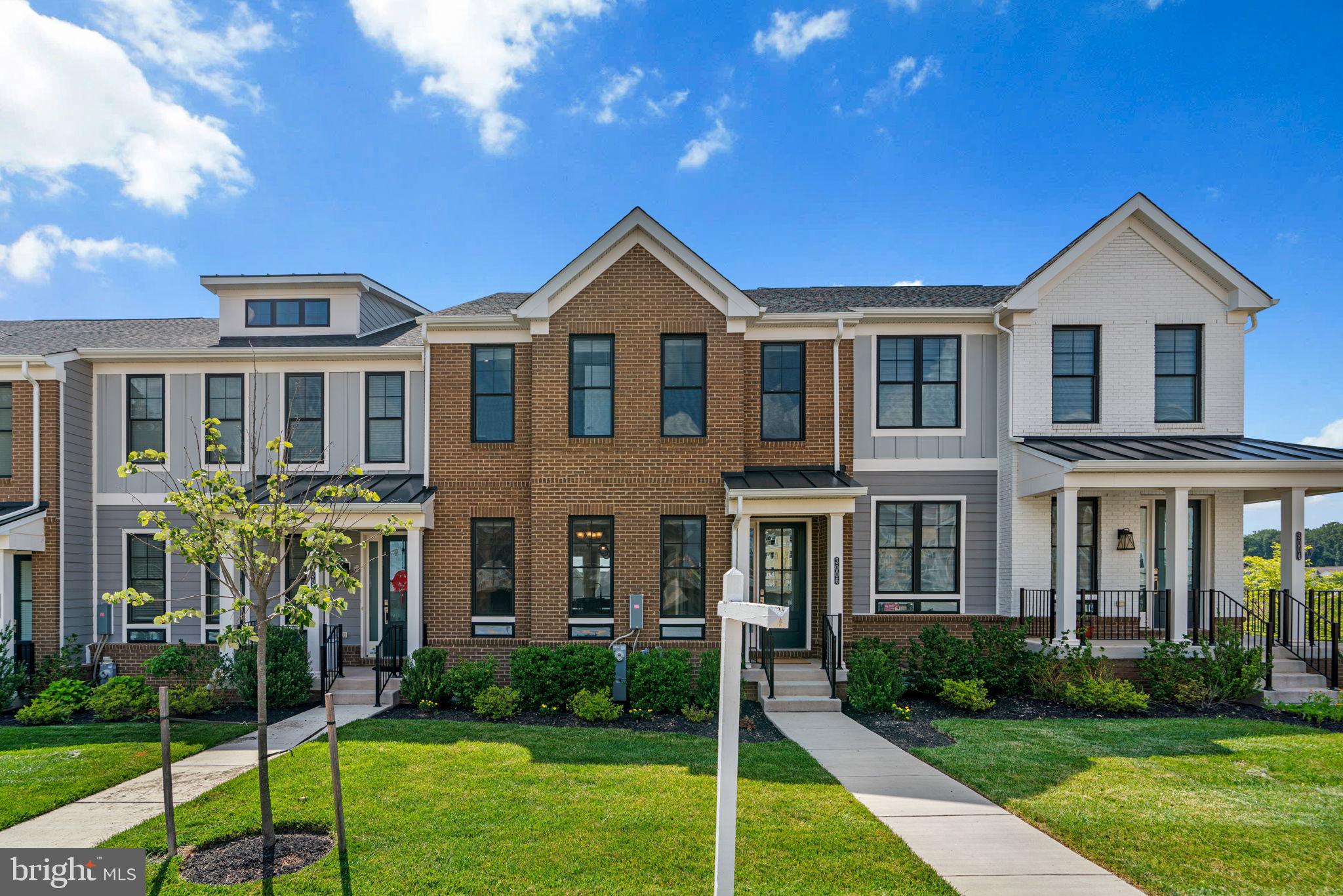 Caperton Village at Turf Valley's finest 3 Bed/3.5 Bath brick Interior Row with a touch of portico is Summer Chic and ready to impress! Party starts in the stylish and functional entry with the perfect coat closet in place and continues into the sunlit Dining/Gourmet Kitchen/Living trio featuring luxe wood flooring, stunning center stage quartz island, beautiful espresso cabinetry, trendy backsplash, chrome hardware, sleek pendant lighting, stainless steel Whirlpool package, organized pantry, bonus closet, Powder Room, and access to composite deck for fab entertaining! Celebrate some more in the Lower Level Rec Room, which can offer the potential for a dedicated Home Office/Gym, with full bath + tiled Mudroom Landing! Rest and recharge in the Primary with tray ceiling + dual vanity + frameless Shower + surround windows + walk-in closet! Down the hall are generously sized Bedrooms #2 and #3, shared Full Bath/Linen, and side-by-side Laundry! Get excited for two independent HVAC systems offering precise temperature control and greater energy efficiency (Main/Basement) + (Upper)! Get pumped for plenty of parking in your very own 2-car rear entry garage with motion activated LED lights/finished walls/extra storage space, driveway fit for two as well as street parking on Forum Place! Enjoy being close to Turf Valley Resort, Alpha Ridge Park, Kiwanis Wallas Baseball Park, Centennial Park, Cypressmede Park, Patapsco Valley State Park, Font Hill Park, Harris Teeter, UPS, Facci, Mad Chef Kitchen & Bar, Asian Court, Subway, Weis Markets, Dunkin Donuts, Urban Kabob, Blowfish Poke & Grill, Black Flag Social House, Main Street, I-70, Route 40, I-695, I-95, Route 29, Route 100, and Route 32! Waverly/Mount View/Marriotts Ridge cluster! See you soon!