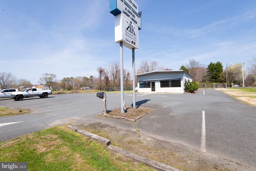 Prime commercial opportunity on highly traveled Ocean Gateway in Cambridge.

This versatile 3,000 +/- sq ft property offers a functional layout with approximately 1,500 sq ft of retail/showroom space and 1,500 sq ft of warehouse, making it ideal for a wide range of uses. The retail area features strong visibility and natural light, while the warehouse includes a large bay door for easy loading, storage, and operations.

Situated on approximately 3/4 acre with a fenced yard, the property is well suited for contractors, service-based businesses, owner-users, or investors looking for a flexible space with both storefront presence and operational capacity.

Located directly on Ocean Gateway, this property benefits from significant daily traffic as well as seasonal beach traffic heading to and from the shore. The easy on/off access makes it convenient for customers, deliveries, and employees alike.

Excellent fit for contractors, landscaping companies, HVAC, plumbing, retail/service businesses, or hybrid office/warehouse users.