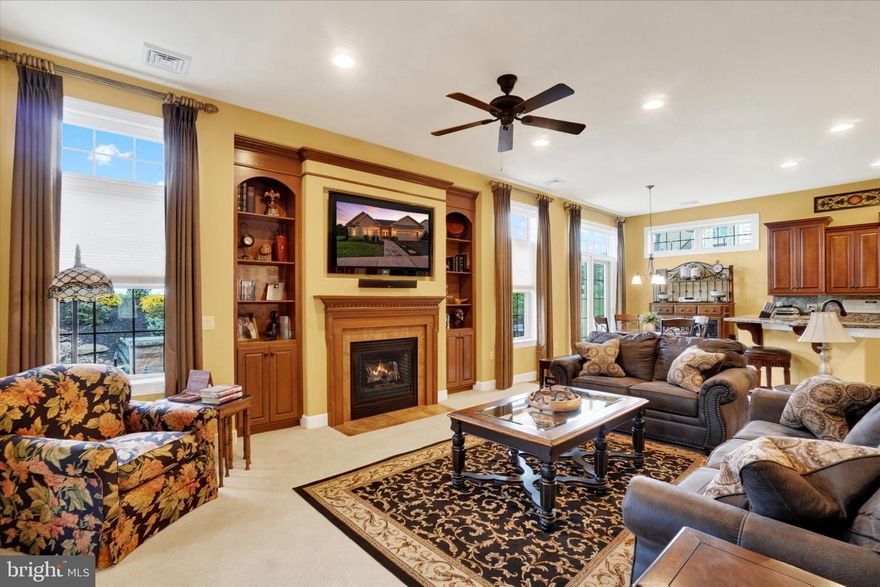 Sunday 1/4/26 - Open House 1-3 pm. Featuring an open-concept layout, this 2–3 bedroom, 2 full bath Parade of Homes model offers comfortable living spaces perfect for everyday life and entertaining. In true builder model fashion, this home includes distinctive features rarely found in today’s new construction. The dining room showcases a one-of-a-kind, hand-plastered designer ceiling with a subtle sparkle. Rounded arches, rounded drywall corners, and soaring 10-foot ceilings add to the home’s grand feel. These high-end appointments and the thoughtfully designed layout are costly to recreate and simply not found in most homes.
True one-floor living is enhanced by a spacious primary suite featuring an oversized bathroom with a soaking tub, updated walk-in shower, walk-in closet, dual vanities, and ceramic tile. The second bedroom on the main level has its own nearby full bath and is located down a separate hallway from the primary suite—ideal for guest privacy or multigenerational living. A private office with French doors is also located in this hallway.
The home offers beautiful gathering spaces, including an open dining area, a kitchen designed for both cooking and connection—allowing you to do the dishes while enjoying time with family watching a movie or relaxing by the fireplace in the large living room. Additional spaces include a breakfast nook, bonus room, and sunroom. Upstairs, the current owners have finished a generous 500-square-foot area that can serve as a third bedroom, expansive work-from-home office, media room, or craft studio.
Additional highlights include tray ceilings, hardwood and ceramic tile flooring, transom windows for added natural light, double wall ovens, upgraded lighting, and a professionally hardscaped patio with a koi pond and waterfall for outdoor enjoyment. Located in a desirable boutique neighborhood close to schools, parks, and major routes, this Red Lion School District home offers true one-floor living with exceptional flex space upstairs. Over 3100 SF, efficient natural gas heat and AC, 2 main floor bedrooms, 1 second floor bedroom/bonus room.