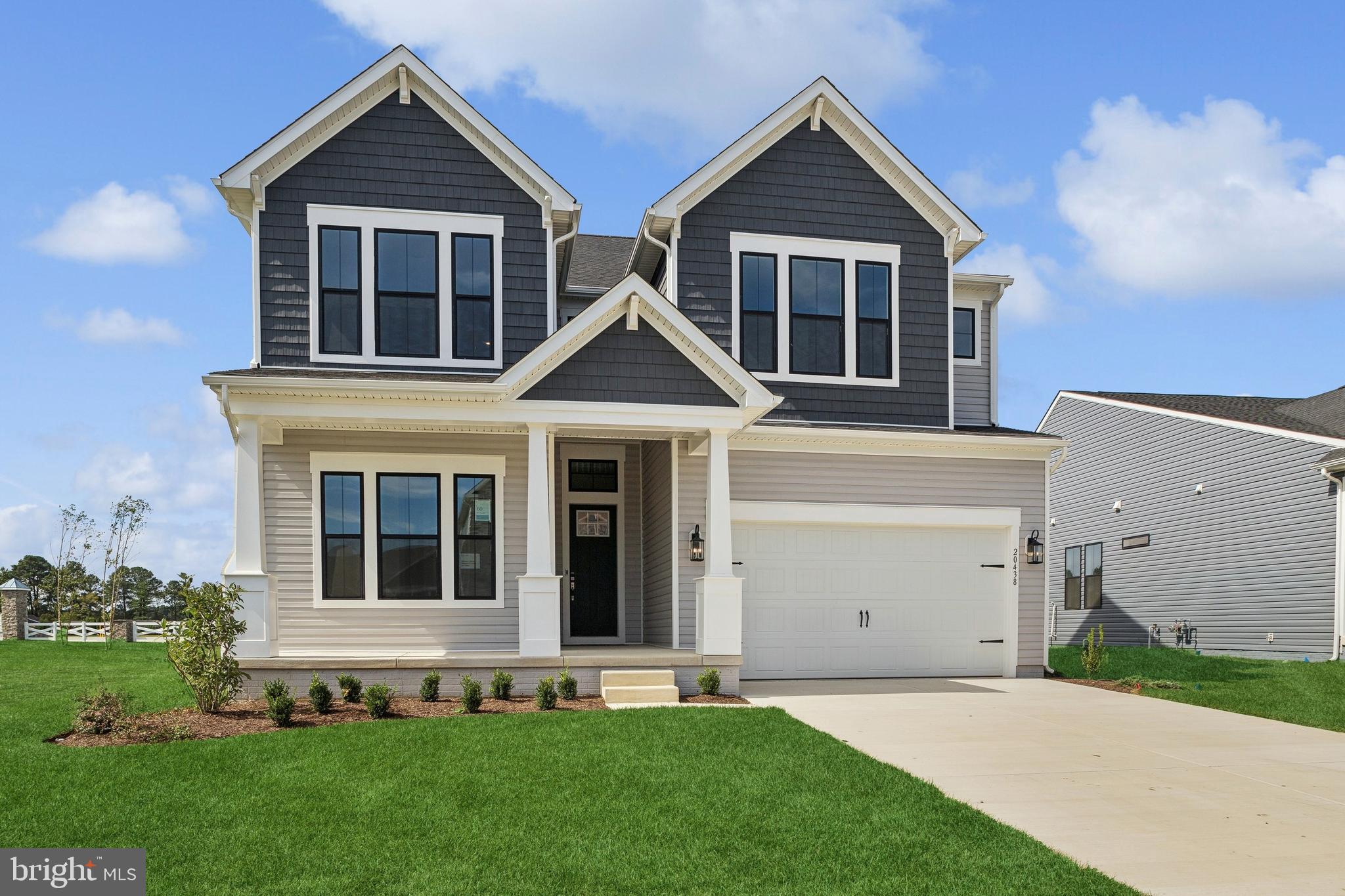 Welcome to the Tuscaloosa, a stunning 5-bedroom, 4.5-bath home designed for flexible living and modern style. With a 3-car garage, open-concept layout, and high-end finishes, this home is the perfect blend of comfort and sophistication.
Enjoy thoughtful details throughout, including a cozy fireplace, versatile home office, bright loft, and a relaxing screened patio. The kitchen features a full suite of premium appliances—including a French door refrigerator, gas cooktop, and tile backsplash—topped with elegant quartz countertops.
The primary suite offers a spa-inspired retreat with a frameless shower featuring a seat and handheld wand, plus double sinks for added functionality. Flooring includes Luxury Vinyl Plank on the main level, tile in all full baths and the laundry room, and plush carpet in the second-floor loft and bedrooms 3, 4, and 5.
For a full list of features for this home, please contact our sales consultants.
Photos are for display purposes only and may not reflect actual selections or layout.
Welcome to a new luxury active adult 55+ community on Maryland's Chesapeake Bay. Discover the amenity-filled, resort-style experience within 45 miles of Washington DC and Baltimore. Residents can take advantage of the community's 24,000 sq. ft. clubhouse with indoor & outdoor pools, a state-of-the-art fitness center, and multiple tennis and pickleball courts. With a full-time lifestyle director on site the community also features a well-maintained calendar of activities such as walking club, indoor and outdoor yoga sessions, mahjong club, kayaking, pickleball and more. Kent Island life is about making friends and enjoying the company of people who have worked hard and now want to enjoy all that a luxury 55+ community has to offer. Located steps from the water and minutes from Annapolis, the location also offers quick access to Rt. 50. Enjoy the convenience of nearby dining and shopping options together with the quaint charm of a small town. *Pictures are representative of a similar home.