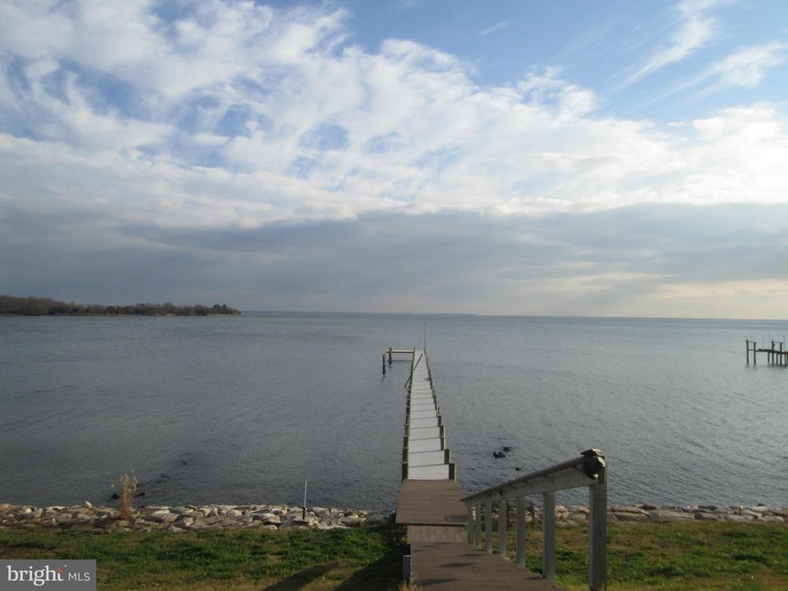 UNDER CONTRACT. SHOW FOR BACK-UPS. Amazing views! Build your dream home! This property already has a perfectly dug well, septic to accommodate a mansion, a 300 foot pier and new 5-car two-level detached garage. Only 6 miles by car and a quick boat ride to Historic Annapolis.  Be close to it all AND away from it all! Compare with MLS #AA8100468.