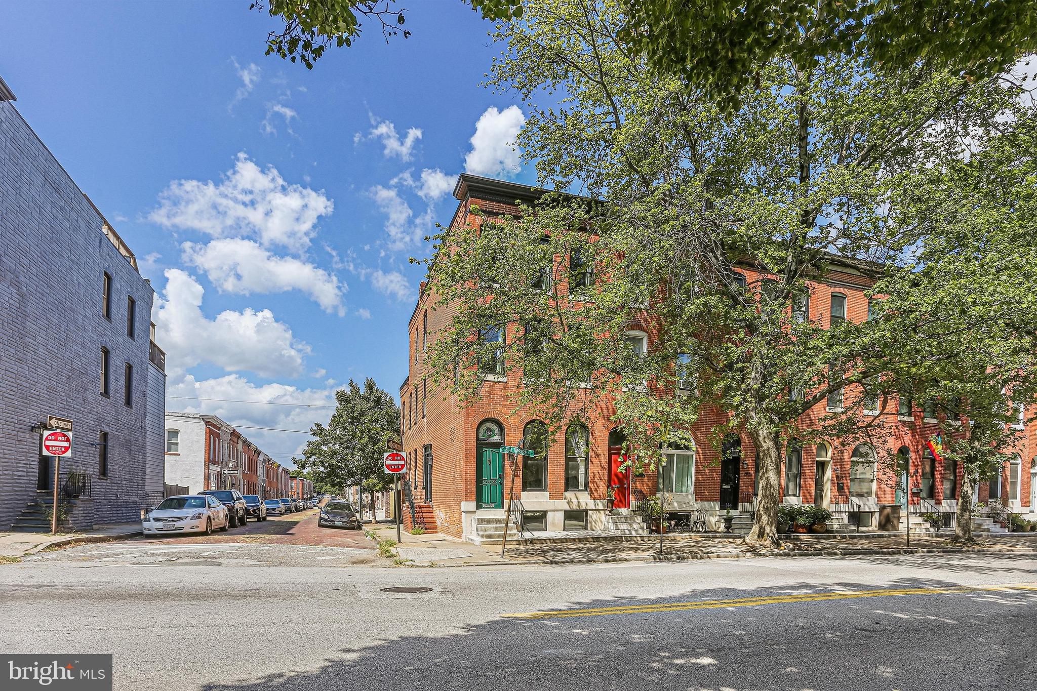 **Approximately 7 Years of CHAP Tax Credit Remaining!** This End-of-Group Brick Townhouse was fully renovated in 2022, creating a truly turn key experience for its new owner! Located in one of the most desirable parts of the Patterson Park Neighborhood, this home is perfectly situated so that you have a direct few of the beautiful green space of Patterson Park. With a 1-car parking pad, complete with an EV charger, this home offers unmatched convenience in a coveted location. Boasting 3 finished levels, plus a large unfinished lower level, this home has 4 bedrooms and 2.5 baths. The fully updated kitchen has 42" cabinets, large island, induction cooking, sleek stainless steel appliances, A half bath and convenient second side entry on the main floor add functional versatility and convenience. The second floor has two large sun-filled bedrooms, an updated full bath with dual vanity and shower/tub, and a convenient upper level laundry room. The third floor holds two more large bedrooms and an additional full bath. Don't forget the best feature of all...7 Years Remaining on the CHAP Tax Credit - take advantage of Massive Tax Savings over the next 7 years, an opportunity not to be missed! All of this and, location location location! Located across the street from Patterson Park, plus nearby shopping, dining, Canton nightlife, and so much more! Don't miss this gem! Updates Include: New Roof and Skylights, Installation of AC including Dual Zoned HVACs, Water Heater, Totally Remodeled Main Level including Kitchen and Half Bath, Renovated Bathrooms, New Electrical and Plumbing, Flooring throughout, and the installation of a Parking Pad - all done in 2022/2023.