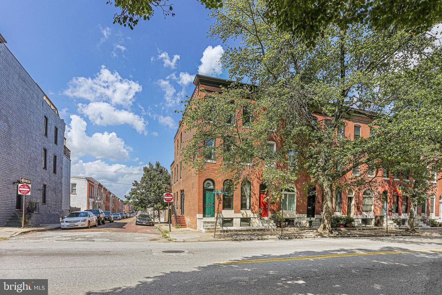 **Approximately 7 Years of CHAP Tax Credit Remaining!** This End-of-Group Brick Townhouse was fully renovated in 2022, creating a truly turn key experience for its new owner! Located in one of the most desirable parts of the Patterson Park Neighborhood, this home is perfectly situated so that you have a direct few of the beautiful green space of Patterson Park. With a 1-car parking pad, complete with an EV charger, this home offers unmatched convenience in a coveted location. Boasting 3 finished levels, plus a large unfinished lower level, this home has 4 bedrooms and 2.5 baths. The fully updated kitchen has 42" cabinets, large island, induction cooking, sleek stainless steel appliances, A half bath and convenient second side entry on the main floor add functional versatility and convenience. The  second floor has  two large sun-filled bedrooms, an updated full bath with dual vanity and shower/tub, and a convenient upper level laundry room. The third floor holds two more large bedrooms and an additional full bath. Don't forget the best feature of all...7 Years Remaining on the CHAP Tax Credit - take advantage of Massive Tax Savings over the next 7 years, an opportunity not to be missed! All of this and, location location location! Located across the street from Patterson Park,  plus nearby shopping, dining, Canton nightlife, and so much more! Don't miss this gem! Updates Include: New Roof and Skylights, Installation of AC including Dual Zoned HVACs, Water Heater, Totally Remodeled Main Level including Kitchen and Half Bath, Renovated Bathrooms, New Electrical and Plumbing, Flooring throughout, and the installation of a Parking Pad - all done in 2022/2023.