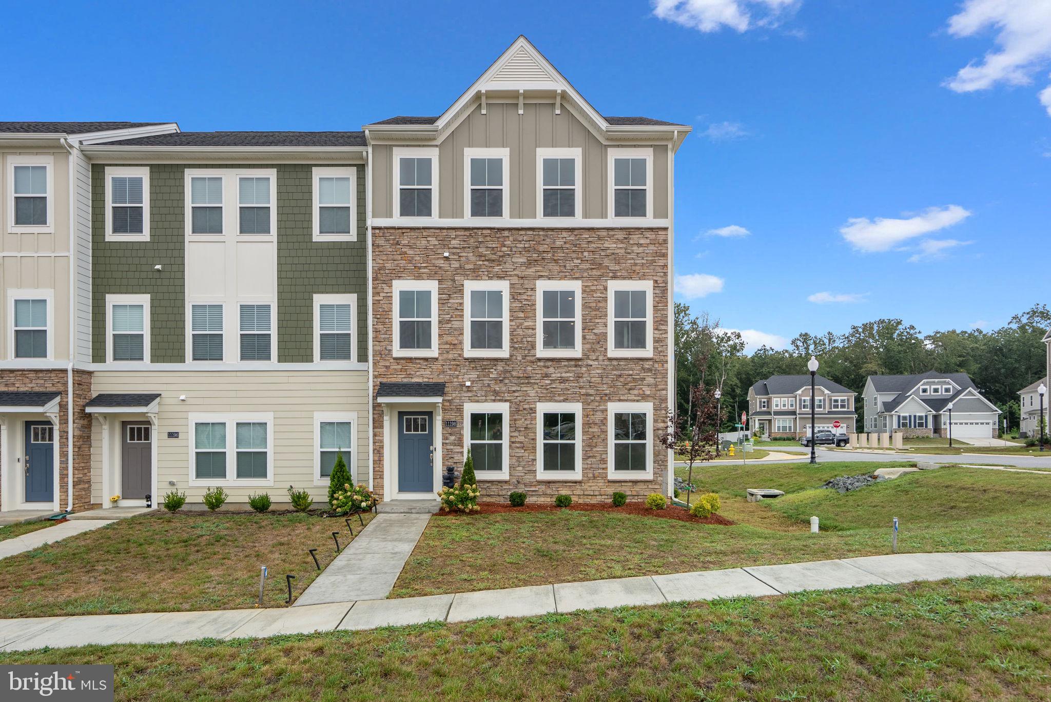 "Welcome Home" to this "Classy & Contemporary" End Unit Townhome in the sought after master planned community of St. Charles Highlands! If open space concept is what you desire this is the home for you! Still brand new - just 1yr old, this lovely 2-Car Garage End-Unit Townhome offers 3-levels of living space with 3 bedrooms and 4 bathrooms (2 full & 2 half). Designer touches & upgraded features throughout! Open and opulent floorplan filled with an abundance of natural light and graced by beautiful luxury plank flooring. Indulge your culinary skills in this awesome gourmet kitchen complete with a center island with seating, stainless steel appliances, granite countertops, and designer cabinetry! Enjoy morning coffee watching the sunrise from your Deck! If you enjoy entertaining, the main level boasts a HUGE open space concept, a sleek family room and cozy dining room nook. The upper level offers 3 bedrooms! The Owner’s Suite includes a private full bathroom and spacious walk-in closet. The laundry room is also conveniently located on the upper level. The finished basement is perfect for cozy gatherings and walks out to the 2-car garage and 4-car driveway! All this AND MORE...Enjoy resort style living at its best! The beautiful community center offers lovely lounge spaces, a conference room, 2 gym workout facilities, a beautiful outdoor pool with lounging options, playgrounds, and dog park for your furry loved ones. All this in one community plus a "Brand New" Elementary School opening August 25th, Margaret J. Thornton Elementary School.