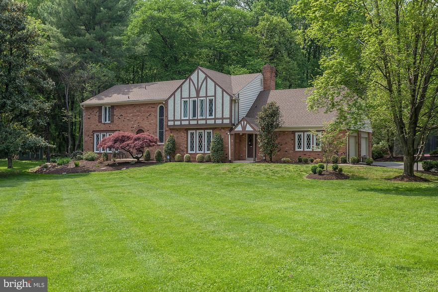 Space to live, relax, & entertain! Elegant, sun-lit Tudor on glorious, private 2 acre lot. 5 large BR up. Updated chef's kit w/breakfast area. FR adjacent to kit w/beautiful stone fp. Huge formal dining room, main level study, beautiful hardwood floors. Tennis court, 2-car gar, powerful outage-free standby generator. Minutes to Fallsgrove, & Potomac Village. Wayside-Hoover-Churchill. Open Sun 2-4