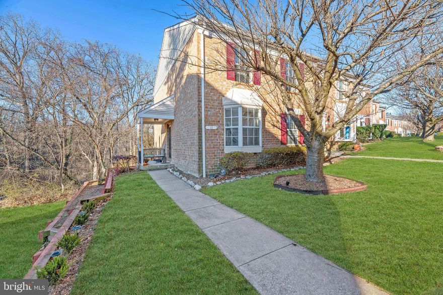 NEWLY RENOVATED END UNIT TOWNHOME IN COURTLAND WOODS! This private, back to trees end unit three level townhome is updated throughout and features Owner's bedroom with walk-in closet, 2 additional spacious bedrooms, 2 full bathrooms and main level powder room, large family room with sliding glass doors to deck,  dining area, eat-in kitchen. Lower level basement area features walk-out for easy and convenient access to big backyard. PERFECT location for easy commute to 695/795 and the convenience of shops, restaurants, transportation, and more! Welcome home!