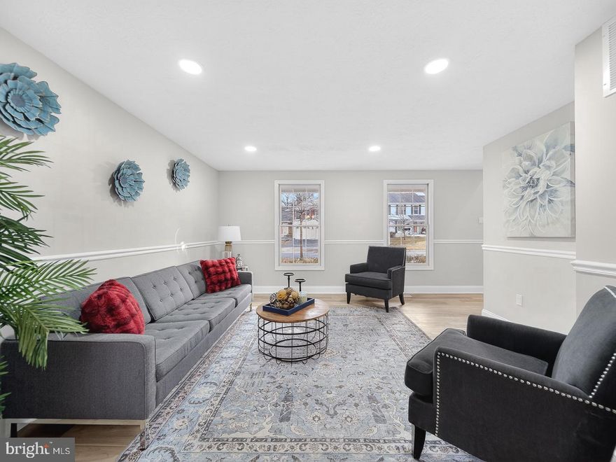 Welcome to this stunningly updated colonial in  Emory Grove Park neighborhood! This impressive home boasts one of the largest floor plans around, featuring 3 bedrooms, 2.5 renovated  bathrooms & a spacious two-car  front load garage with a driveway on a  fenced corner lot .  Has you Step inside  you will  discover a bright and airy living room&Dinning room with tons of  natural light .  The floors are Gorgeous on ALL three levels,The open floor plan seamlessly connects the dining area to the kitchen and a cozy family room. The kitchen is Gorgeously renovated , showcasing sleek Quartz countertops, brand-new cabinets,  New stainless steel appliances, and generous storage space.  The family room features a charming fireplace and sliding glass doors that open Up to  a large  deck overlooking a fenced backyard—perfect for summer BBQs and entertaining. Upstairs, the primary bedroom offers a serene retreat with a spacious layout, large walk-in closet, and a luxurious  suite bathroom with high-end finishes. You will find 2 additional generously sized bedrooms and a  renovated hallway bathroom with stylish  tiles and a substantial vanity. The fully finished walk-up lower level provides a spacious recreation room and a versatile utility room with laundry room.This home has a newer HVAC system and an updated hot water heater& and newer roof . This home is move-in ready. Lets talk Location...located near shopping, dining, and major commuter routes, you’ll also be close to the upcoming North Pointe @  Flower Hill,  The new development with retail and dining options. Enjoy easy access to Shady Grove Metro Station, I-270, ICC/200, and Shady Grove Medical Center. This home is a  exceptional Home to live in Montgomery county!!