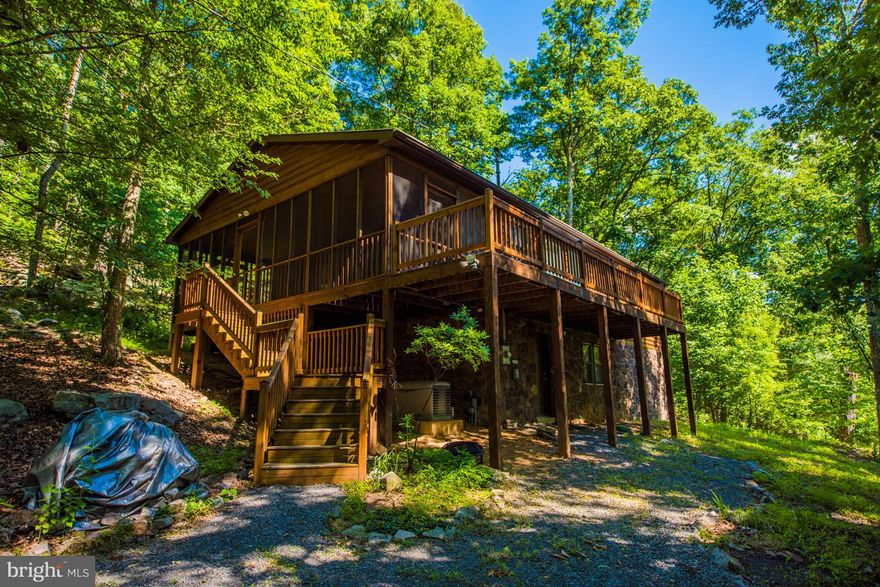 Secluded Cedar Rancher, 9.74 acres with river access, 3 bedroom, 2 bath, Cathedral ceiling, large windows for watching the wildlife & seasonal view. Nice Cabinetry with kitchen island, Central air and heat, wood laminate floors, Great room and Family/ Rec. Room. Large screen porch and deck, New shed, New whole house generator, New water softening system, New pellet stove. Schedule an appointment !