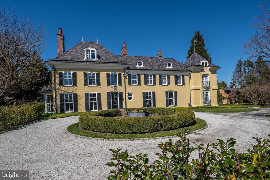 This French Country residence sits majestically on a gently rising, superior 1.5 acre lot in one of the best neighborhoods in northside Villanova on a walkable cul-de-sac.   An executive retreat featuring approximately 9000 square feet of exquisite living space which  was originally designed by the renowned architect, Walter K. Durham. The architectural goal of the 2018 renovation was to preserve and enhance the original dramatic "Durham" design elements, such as floor to ceiling windows to produce a home that is perfect for gracious entertaining or relaxing at home.  An open floor plan, coming in from the courtyard is seen visually  throughout the house to the gorgeous pool area and walled courtyard, creating a melding of interior and exterior spaces. The chef's dream gourmet kitchen opens up to a spacious great room with breathtaking views of the glorious grounds, pool, spa, terraces and pool house. Gracious room sizes with high ceilings, expansive bright windows and a wonderful open flow. The home features 5 en-suite bedrooms, 6 full and 2 half custom baths and a fully finished daylight lower level. The entire landscape was designed by an award winning Landscape Architect. A European gravel entrance circular auto court, rear walled courtyard, an Alee' of "tree form" white hydrangeas, magical English Oak Pyramid street trees, Blue Princess Holly detailing, extensive Belgian block borders and Pennsylvania Blue-stone capped walls. Vermont slate roof, copper down spouts and gutters, extensive exterior molding detail, one of a kind custom crystal and brass detailed railings, and much more.