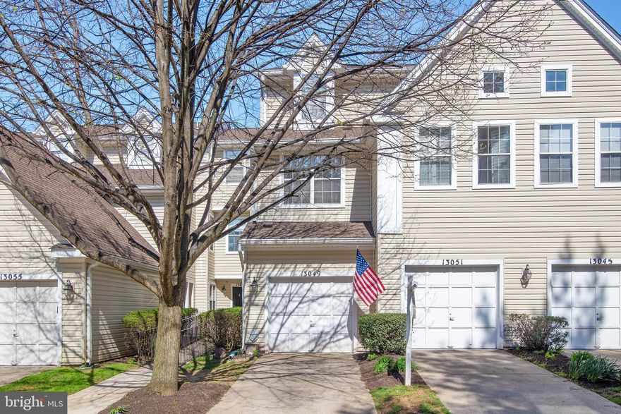 Don't miss out on this well maintained townhome with a 1 car attached garage and driveway. Bright and open floor plan with new carpet, fresh paint, 2 story ceilings and full size washer and dryer on the upper level.  Spacious kitchen with stainless steel appliances, gas stove, built in microwave and pantry. Master Suite with his and her walk in closets and attached full bath with a double vanity. Second bedroom has it's own attached full bath and built ins. Cozy up next to the gas fireplace on those cold winter nights or relax on your private balcony on those cool summer days.  Walk to Black Hill Park or head over to the shops, restaurants and other attractions that Germantown has to offer. Minutes from 270 and the Marc Train.