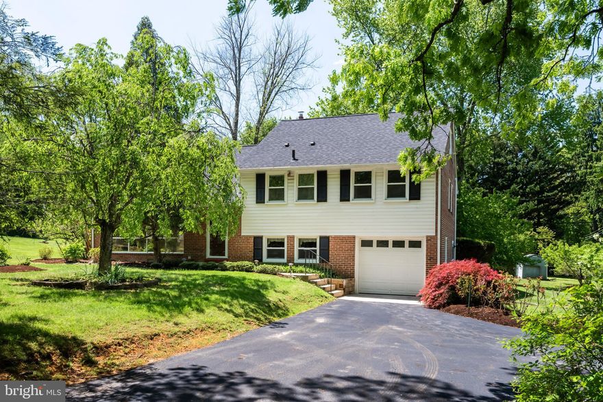 Welcome to 824 Old Eagle School Road, a solidly built and nicely updated four-bedroom home in the heart of the award-winning Tredyffrin-Easttown School District. This property features four finished living levels, beautifully refinished hardwood floors, numerous major system upgrades, and a deep rear yard with mature landscaping. A rare opportunity to own a well-maintained home with a nice yard in Wayne. The entrance foyer opens to a bright, sunny living room highlighted by a wall of windows and a wood-burning fireplace with a brick surround and a stainless steel chimney liner installed in 2019. The formal dining room is perfectly suited for family gatherings and holiday celebrations. The eat-in kitchen offers raised-panel cabinetry, generous granite counter space, stainless steel appliances, and a brand-new electric range installed in April 2026. A doorway off the dining room leads to the rear deck overlooking the deep grounds with mature plantings and shade trees—an ideal setting for grilling, outdoor dining, and entertaining. The lower level features a nicely finished family room with direct access to the one-car garage and a large laundry/utility room. The laundry area and powder room were remodeled in 2022, completing this comfortable and functional level of the home. The second floor is home to the owner’s suite with a private bathroom, along with two generously sized bedrooms served by an updated hall bathroom. The finished third floor offers flexible living space that could function as a fourth bedroom, home office, playroom, or additional family room. A floored attic provides tremendous storage space and future potential. Recent upgrades and improvements include a new high-efficiency air conditioning system installed in 2025, a new roof in 2022, many energy-efficient replacement windows in 2023, refinished hardwood floors in May 2026, new front and laundry doors in 2022, a new garage door in 2019, a gas water heater installed in 2019. 824 Old Eagle School Road is a wonderful place to call home. Located close to the King of Prussia Town Center, Valley Forge National Park and the shops, restaurants and trains of The Main Line. This is the one, welcome home!
