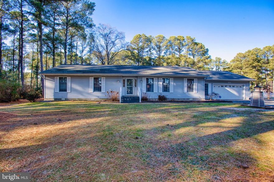 Welcome to this brand-new listing in the Annamessick Ridge Community of Crisfield! This adorable three-bedroom, two-bath home is a true custom coastal charmer. Enjoy a private dock complete with a boat lift and a fishing-clean station, making it easy to head out on the water anytime. A community boat ramp for added convenience. This home is all about embracing the waterfront lifestyle and enjoying everything this fantastic location has to offer. 
Inside, the kitchen showcases classic Crisfield crab charm, featuring quartz countertops and ample storage. A living/dining area is located just off the kitchen and overlooks the back enclosed porch, creating a comfortable flow for everyday living and entertaining. The home also offers a separate dining room and a dedicated living room, providing flexible spaces to relax and gather.
Perfectly positioned to take on the waterways and enjoy everything this home’s location has to offer, this property delivers the laid-back coastal lifestyle of the Eastern Shore.