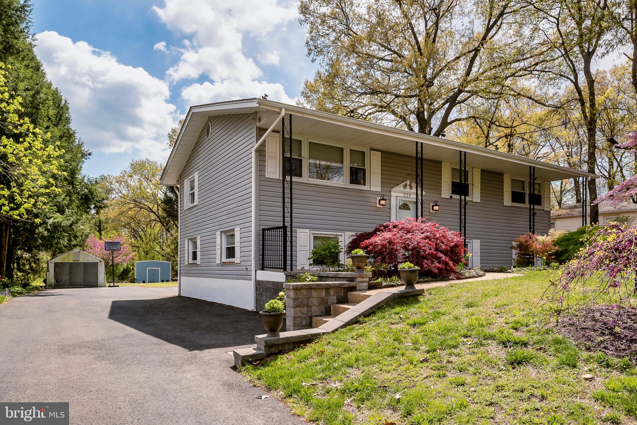 OFFERS DUE Tuesday 4/27/21 by noon. Beautiful home on almost an acre lot with No HOA. Bright kitchen with stainless steel appliances and new flooring. 3 bedrooms with hardwood floors and LARGE bathroom on main level. Bathroom has large shower with dual heads and separate oversized bathtub. Downstairs is club Room with great bar and large family room area plus full bathroom. Enjoy many BBQs on your full size deck or underneath on your patio. Oversized driveway can fit 6 cars. 2 sheds with great storage. Close to Baltimore, DC and Annapolis and all the shopping you need. OFFERS DUE Tuesday 4/27/21 by noon.